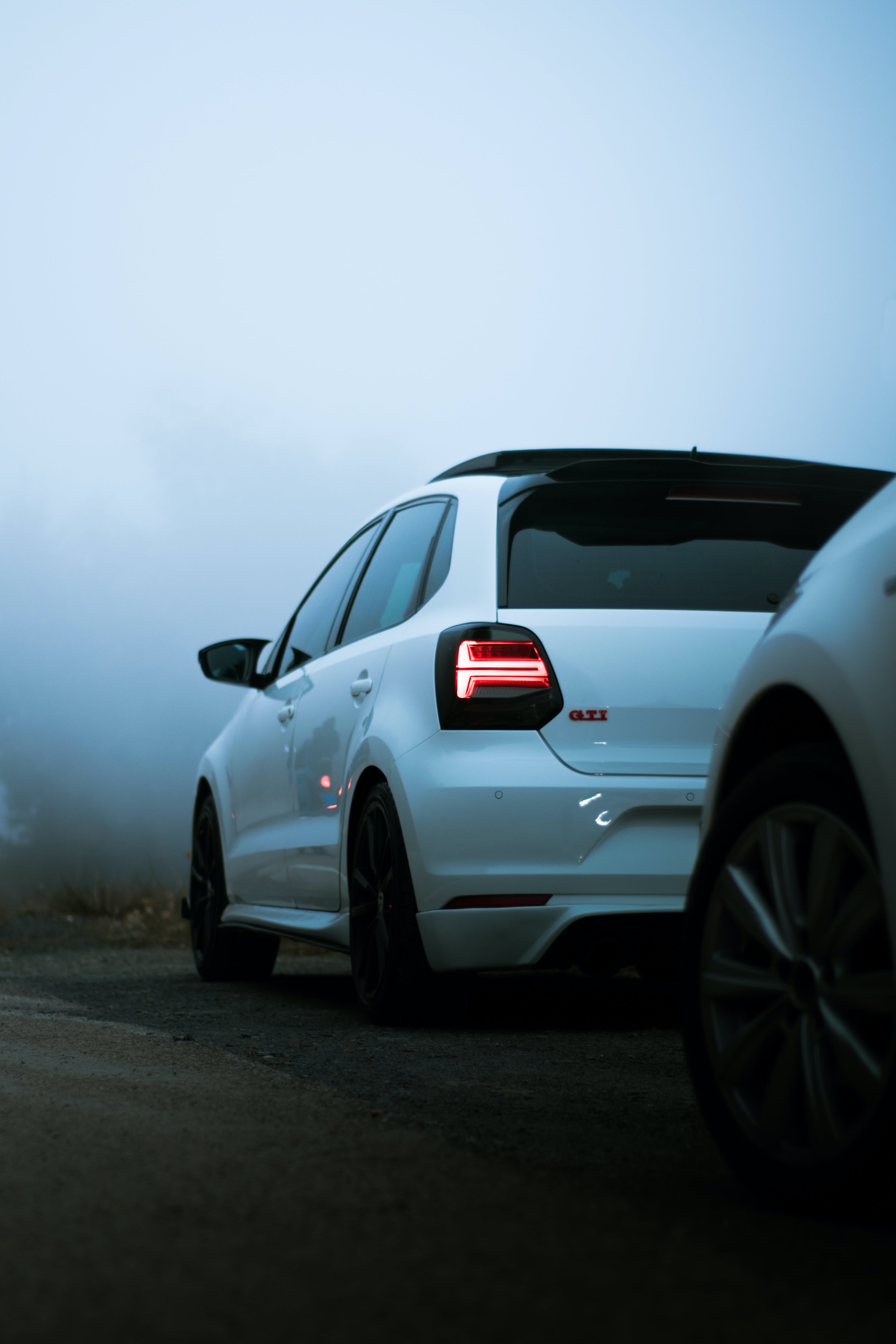 White Volkswagen Polo GTI on a Foggy