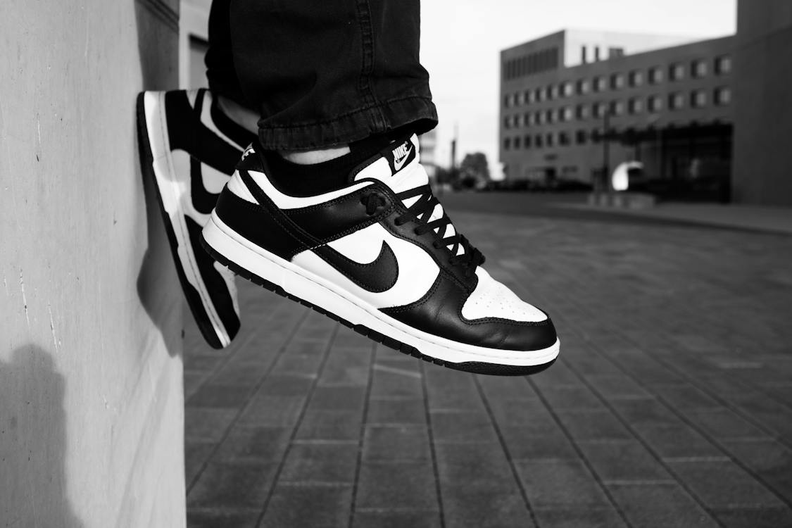 Wearing Black and White Nike Sneakers