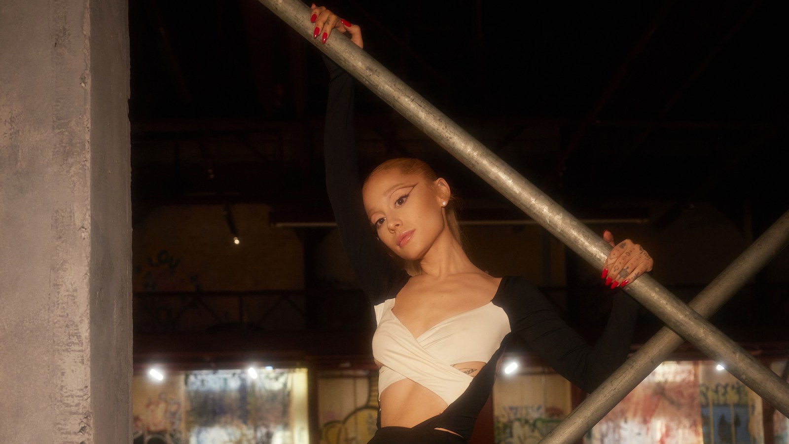 Ariana Grande Strikes a Pose With House