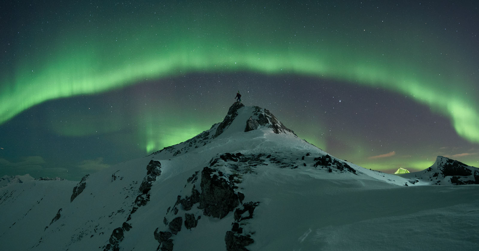 Skier Under the Northern Lights