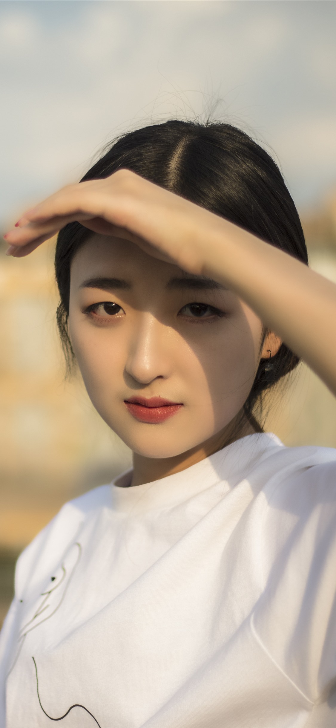 Beautiful Chinese girl, hand, sunshine