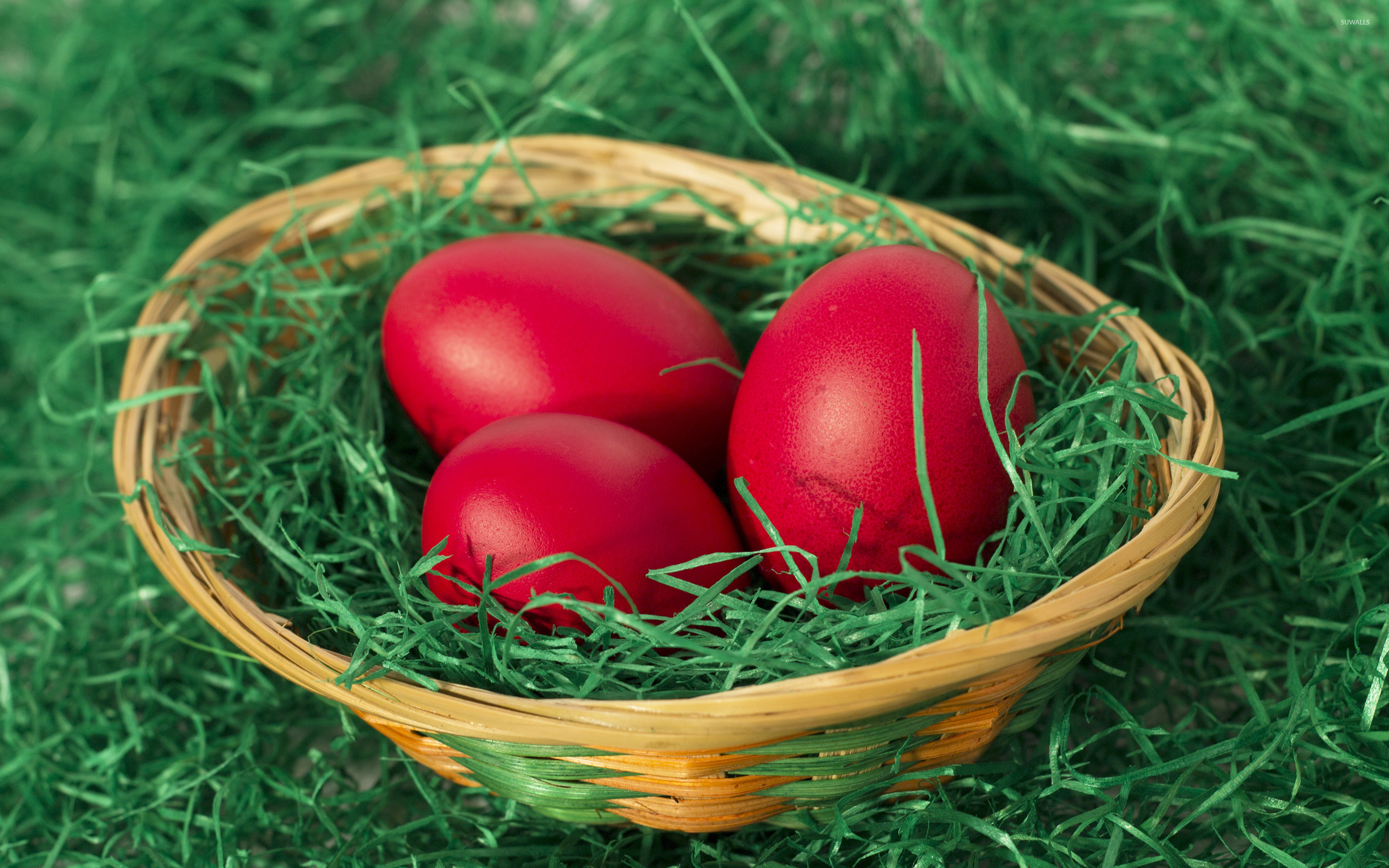 Easter eggs in a basket wallpaper
