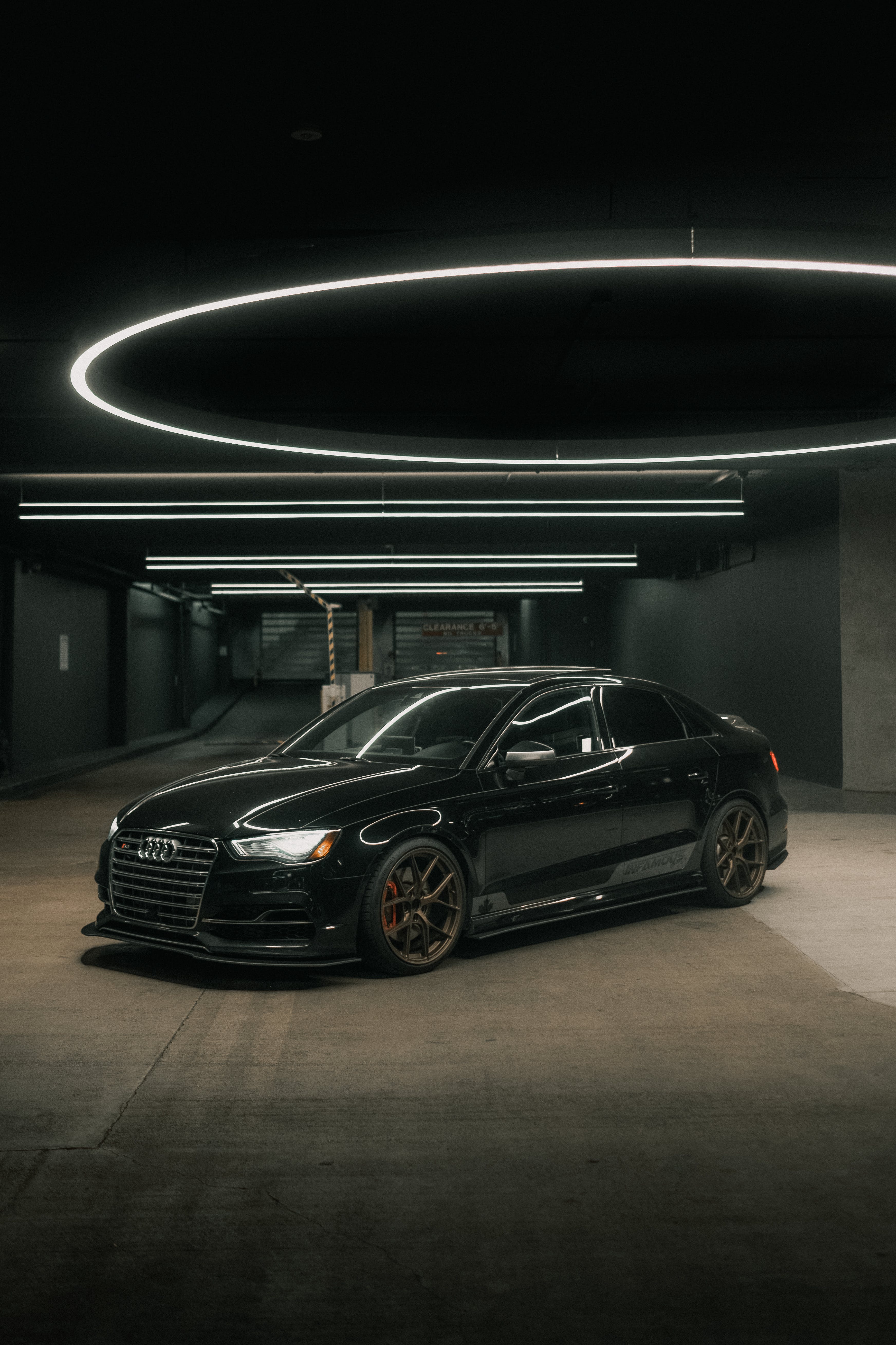 Black Audi Car Parked on a Garage