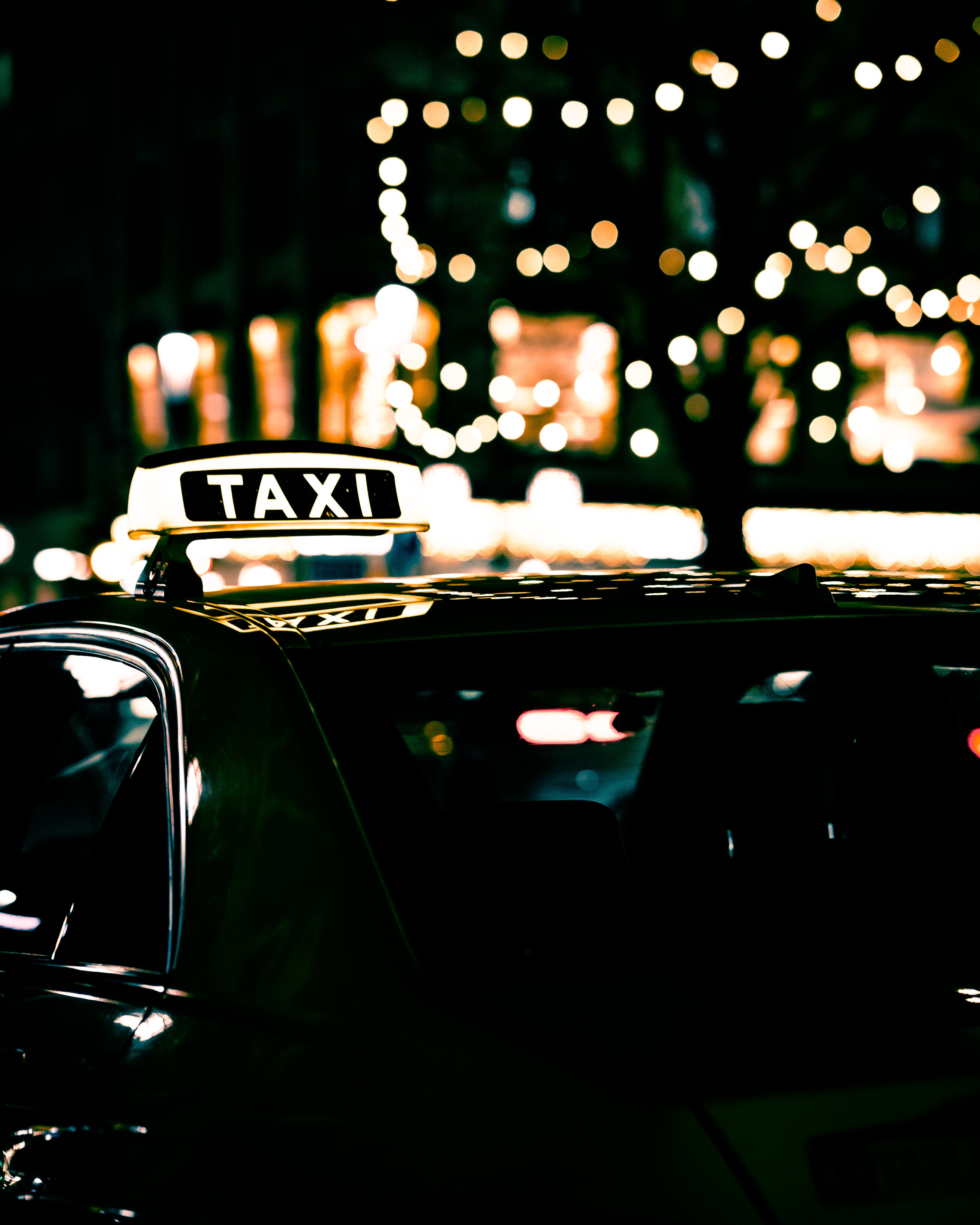 Black Taxi Near Lights · Free