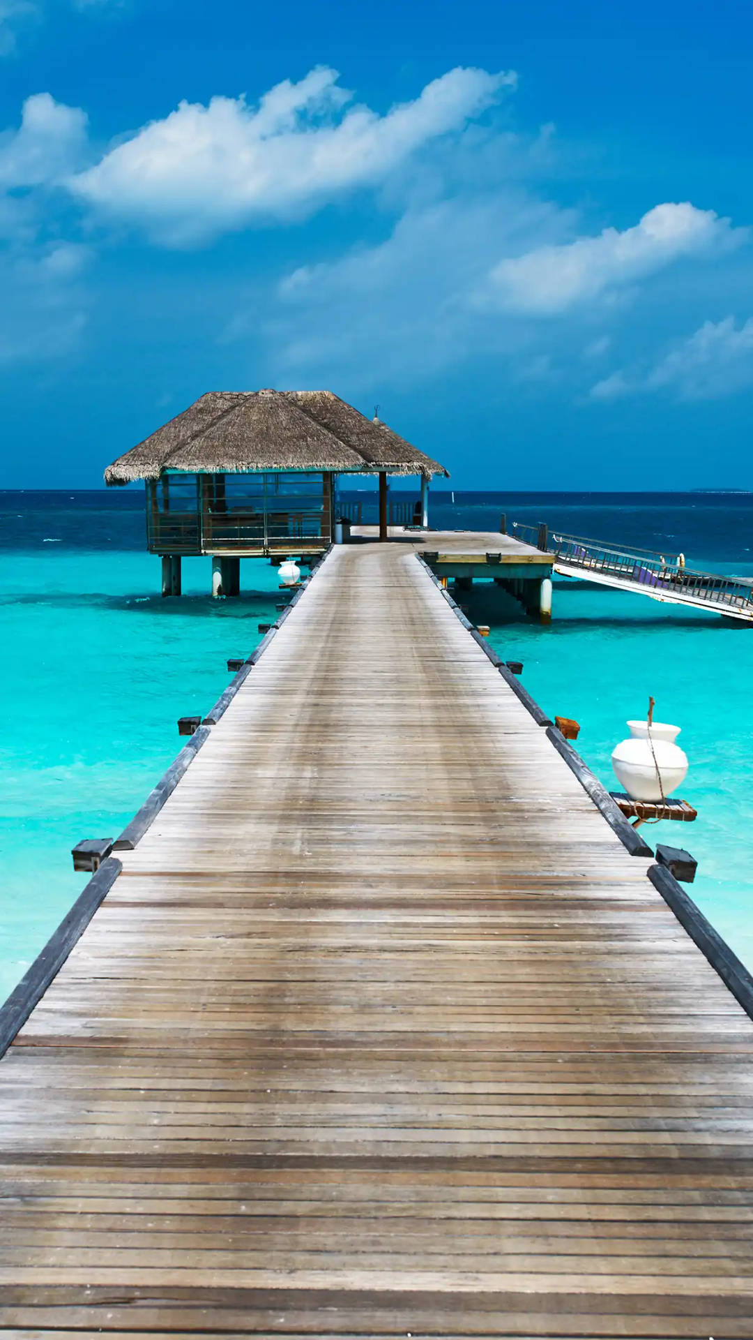 Download iPhone X Beach Hut Wallpaper