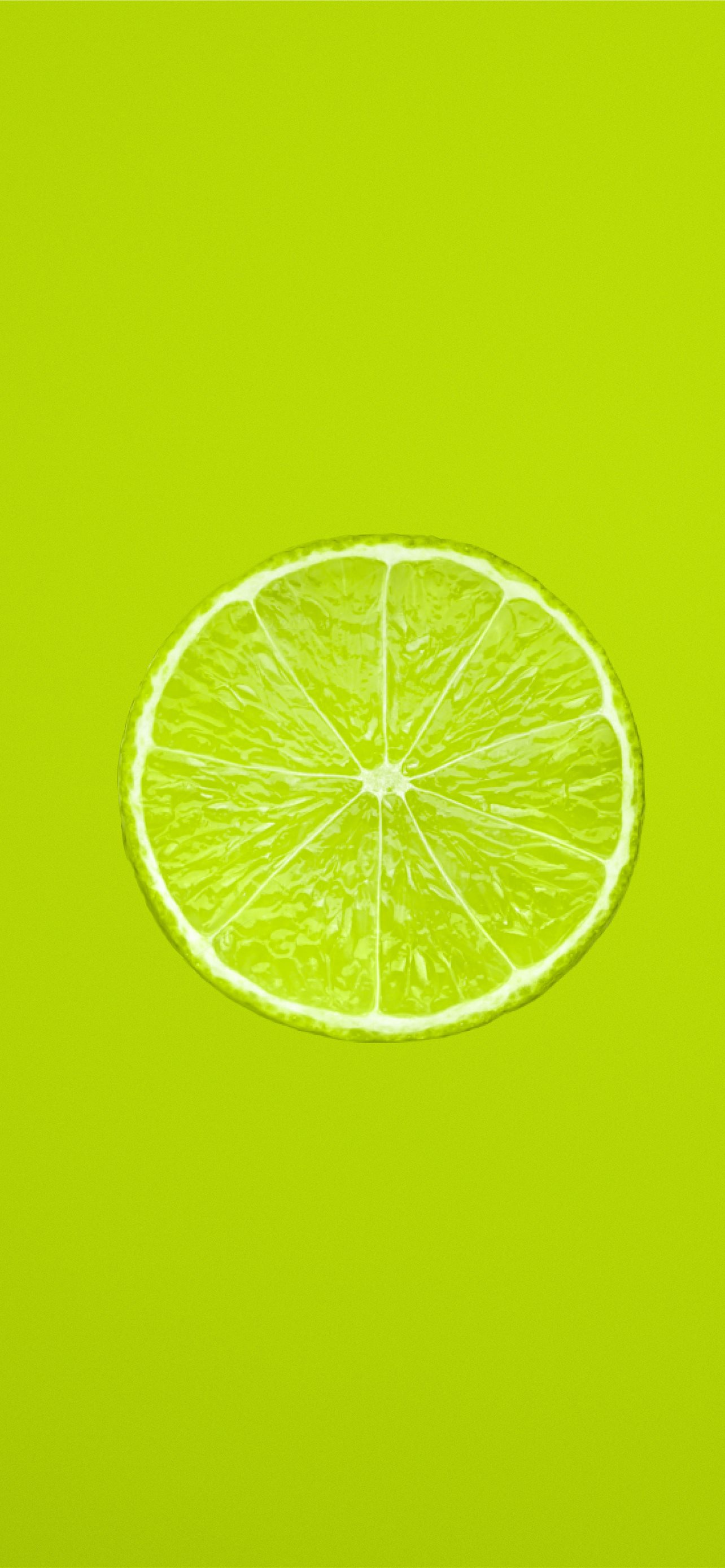 yellow lemon fruit on green background