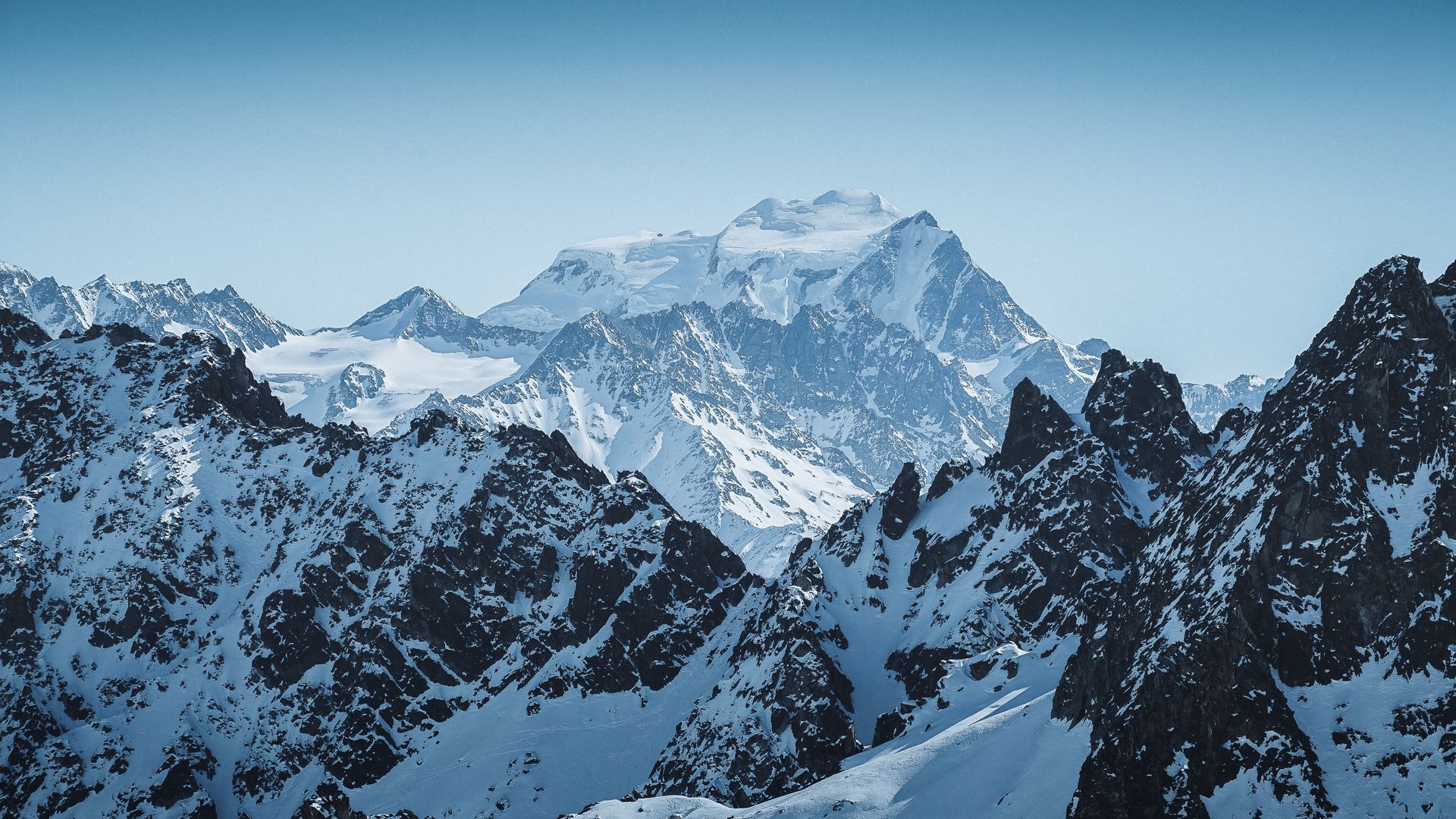 Majestic Snowy Mountain Range Wallpaper