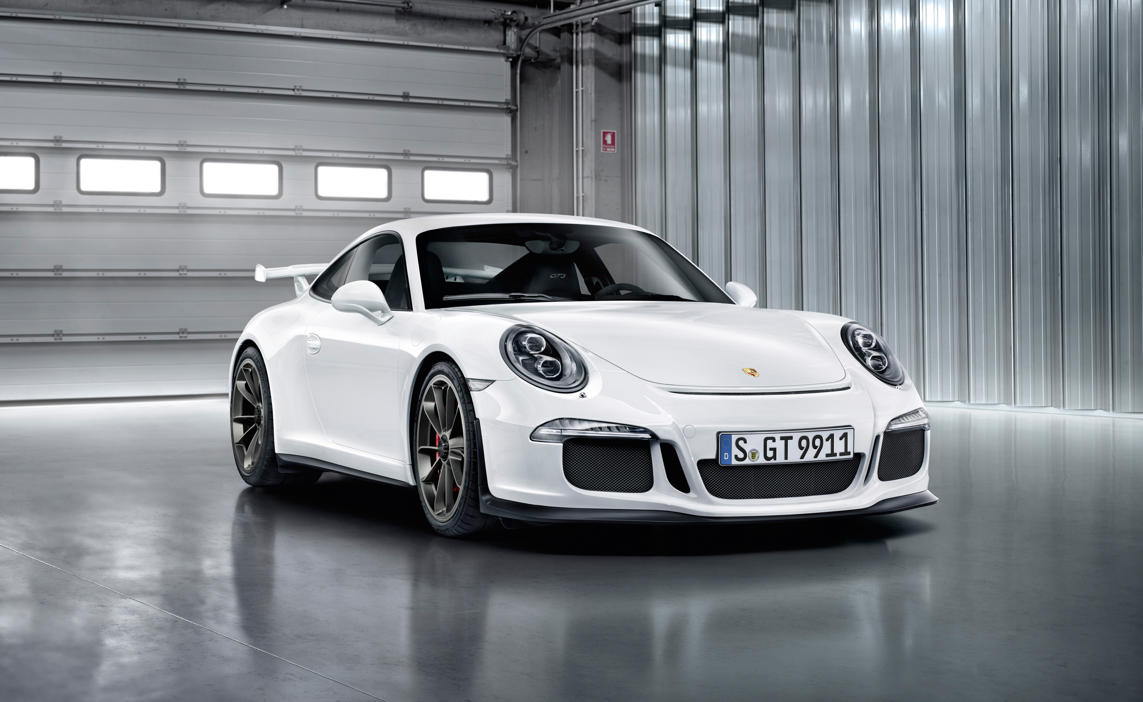 Wallpaper White Porsche 911 Parked in a