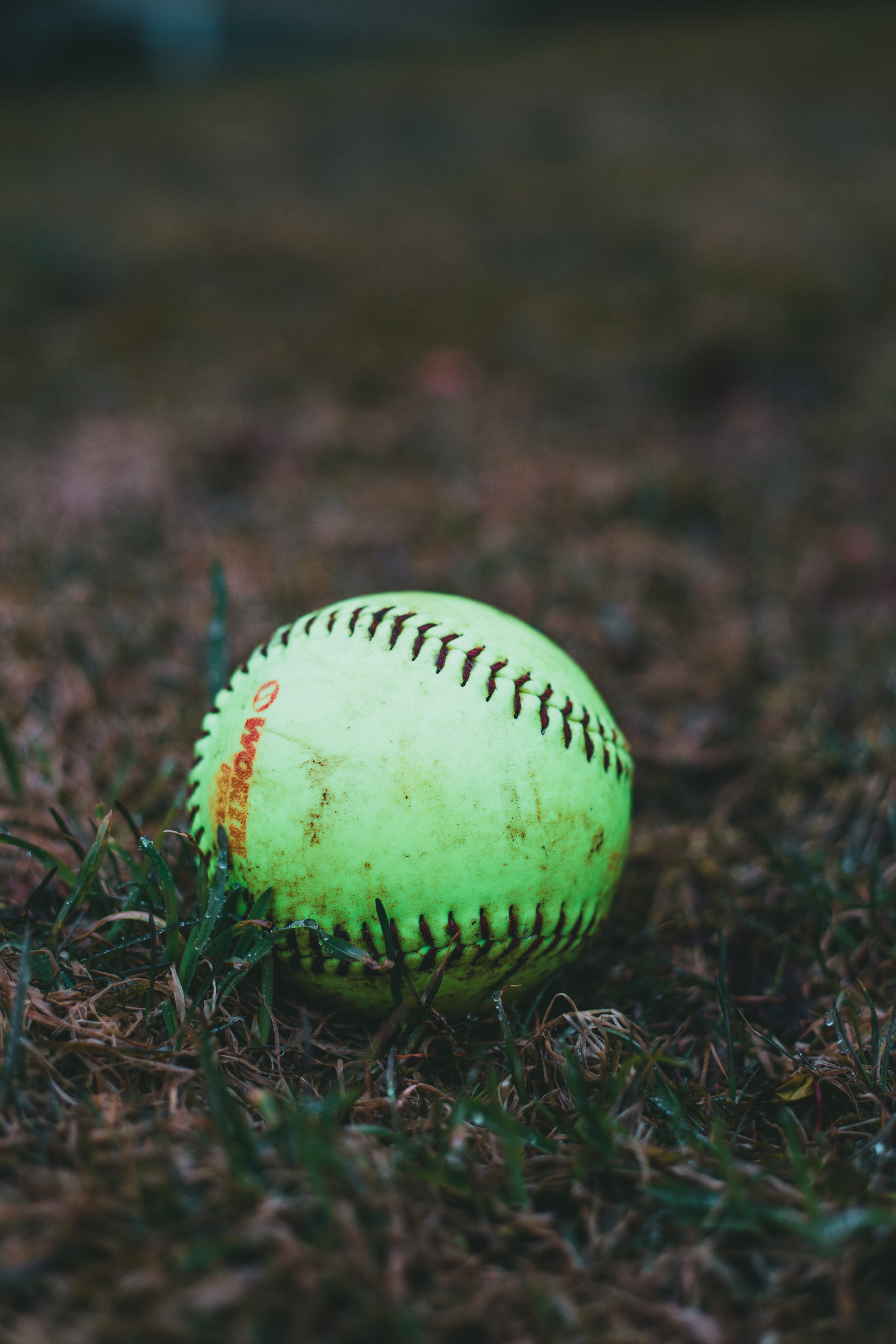 Close Up Shot Of A Green Baseball On A