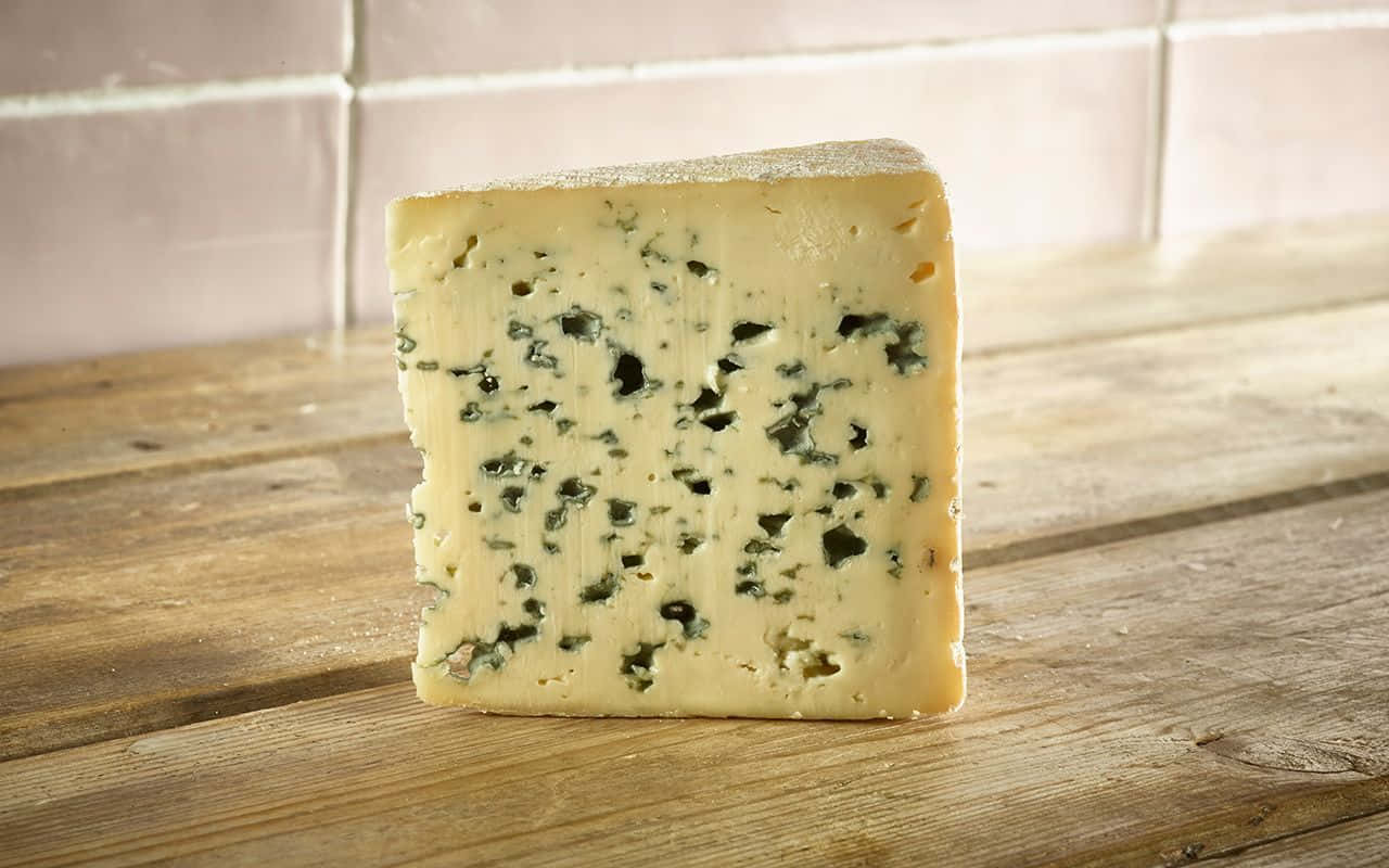 delicious wedge of blue cheese