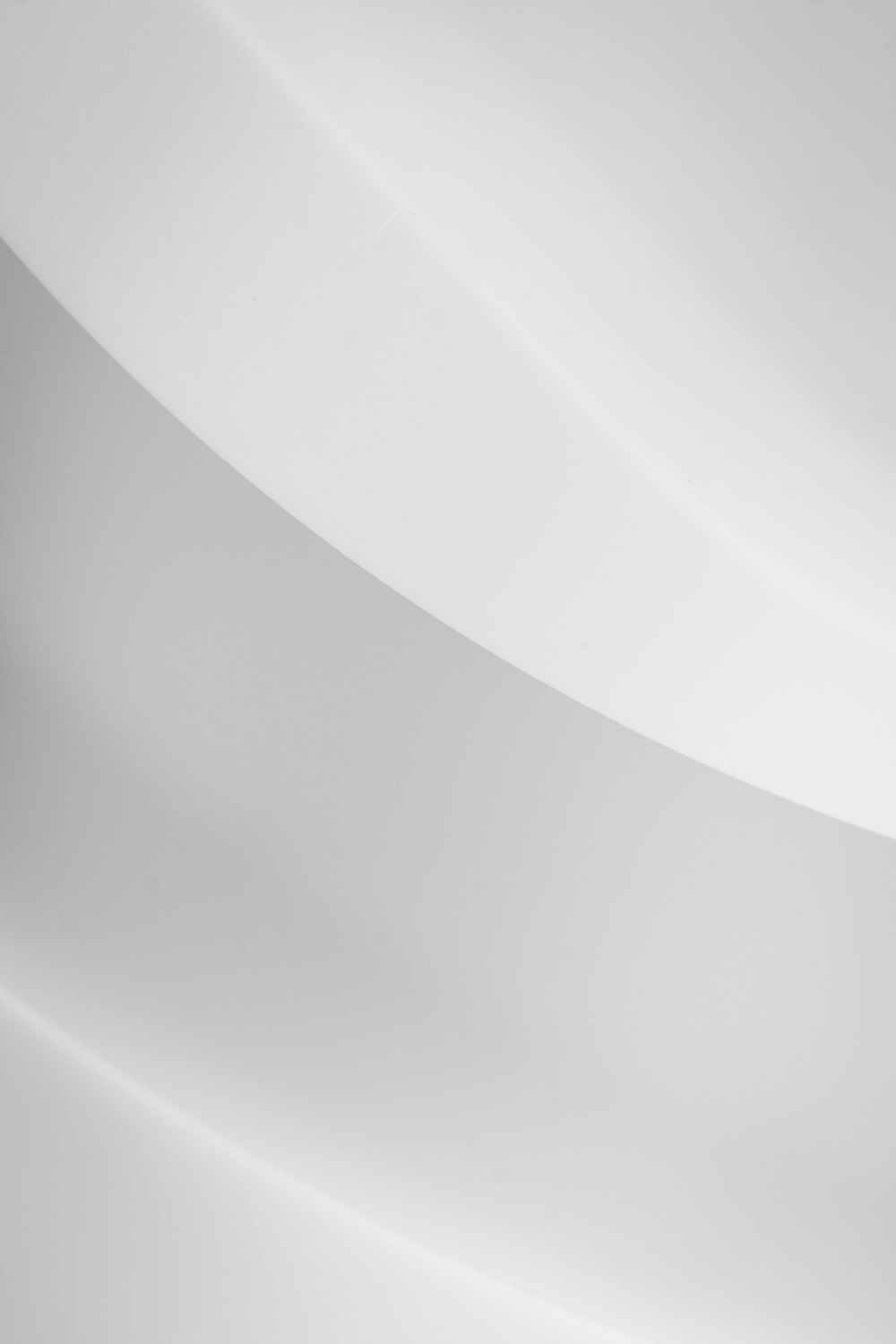 A man riding a snowboard down a snow