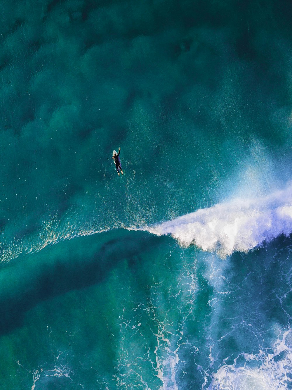 High Angle Photography Of Man Surfing