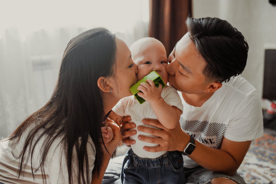 Mother Kissing a Baby · Free