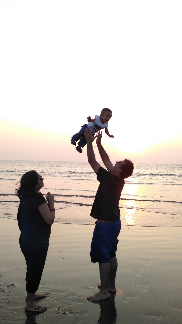 father mother son image #baby beach