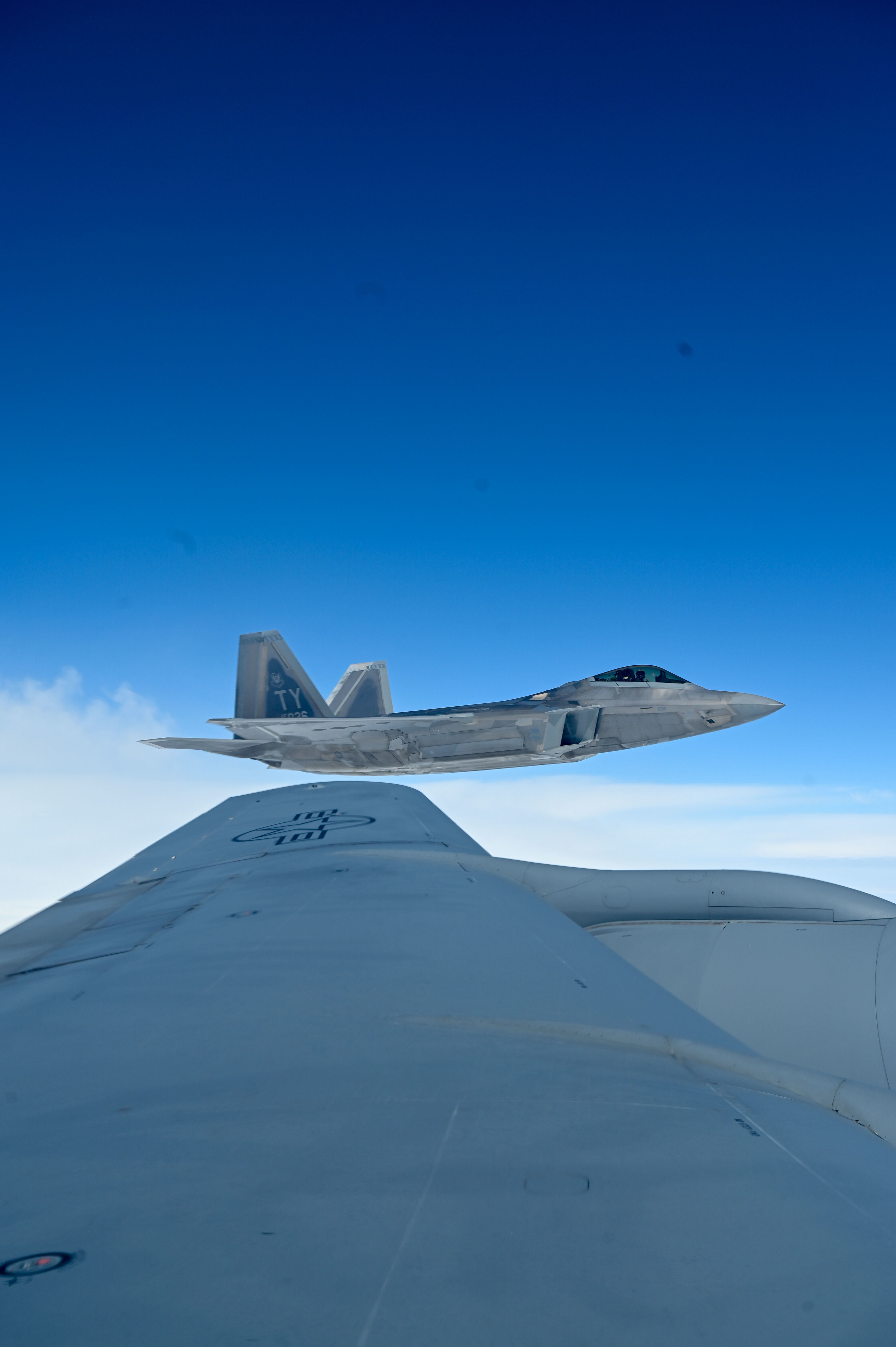 Eight F 22 Raptors Refuel With Okies