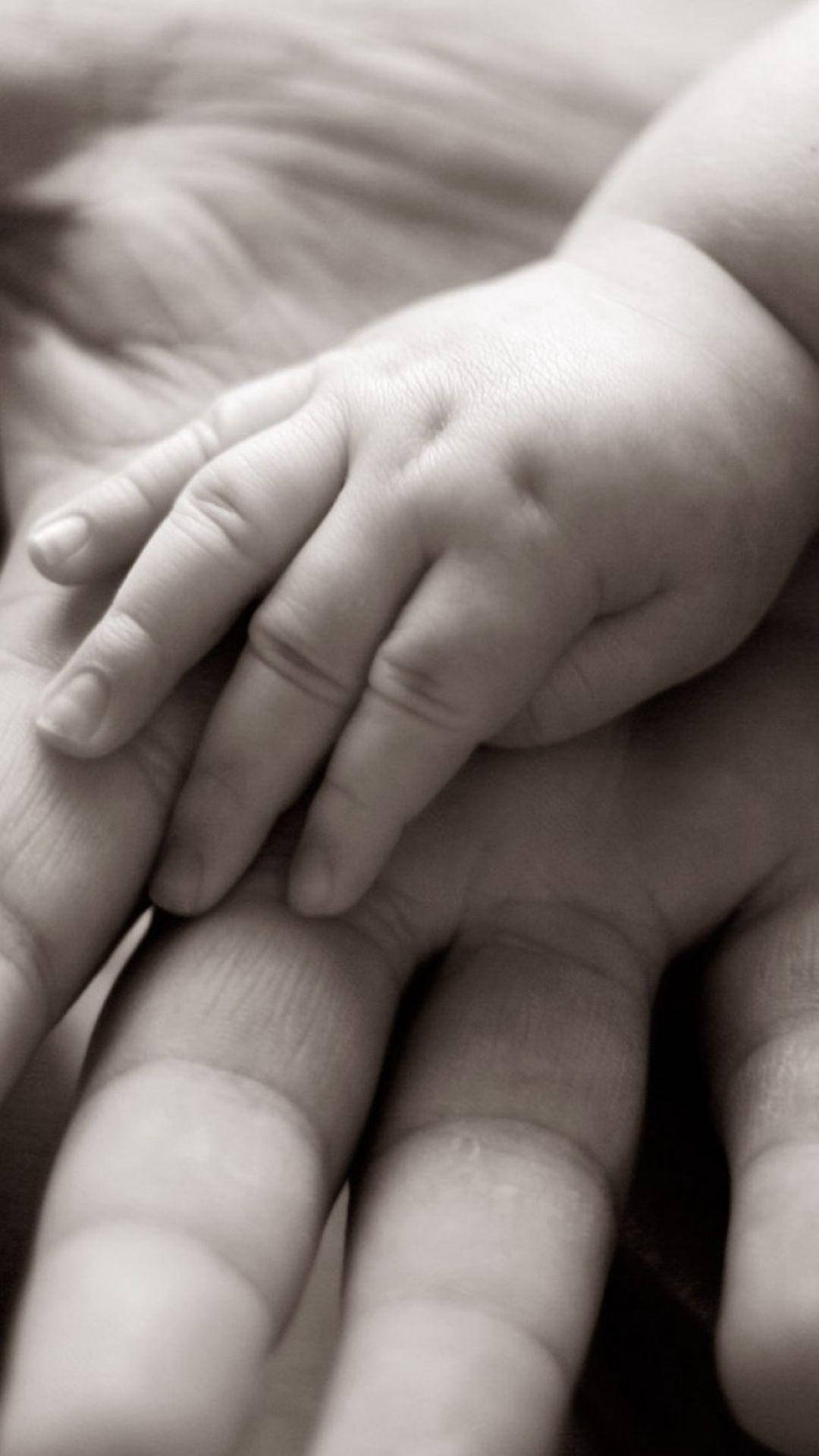 Download Hand In Hand Baby With Mother Wallpaper