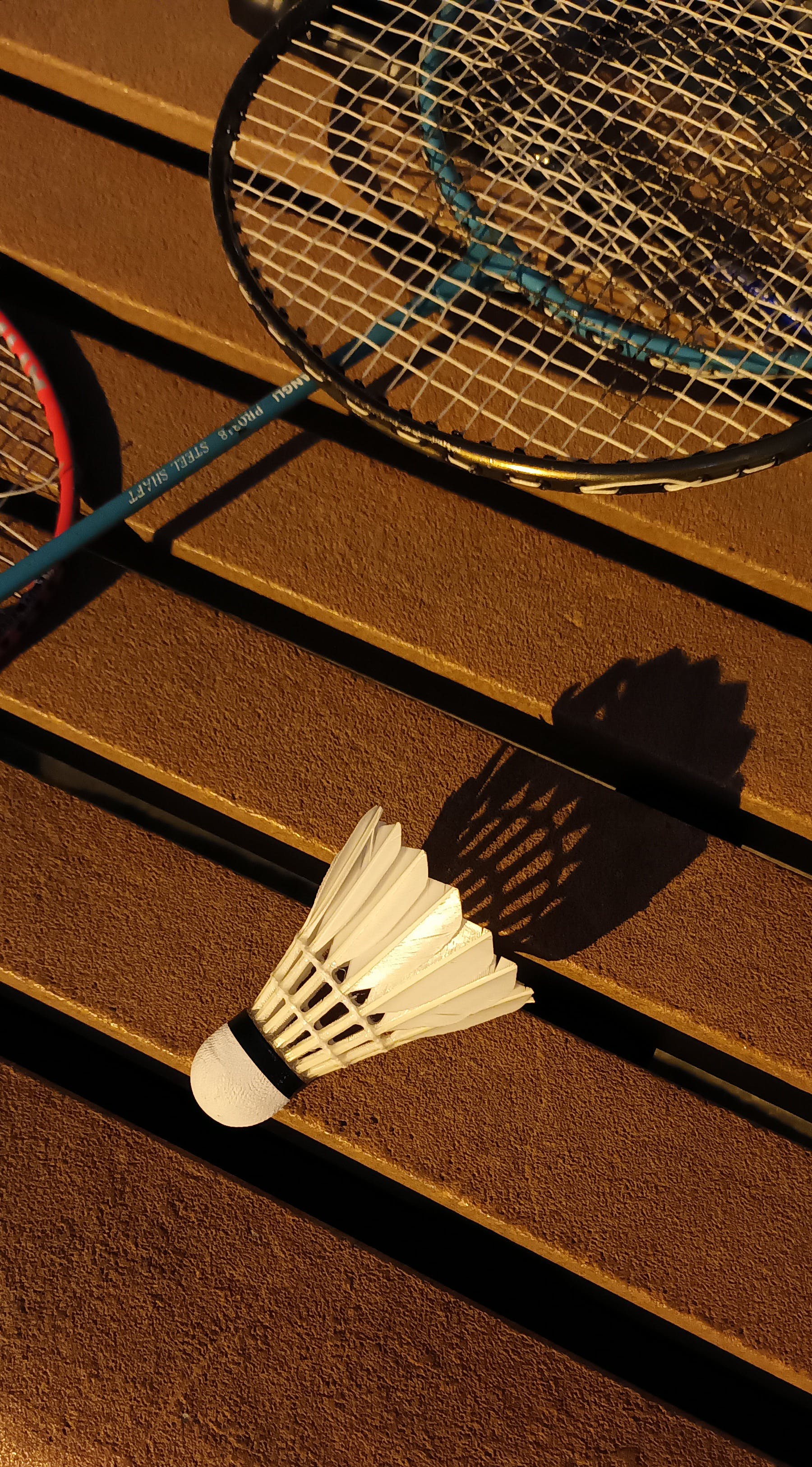 Shuttlecock and Badminton Rackets on a