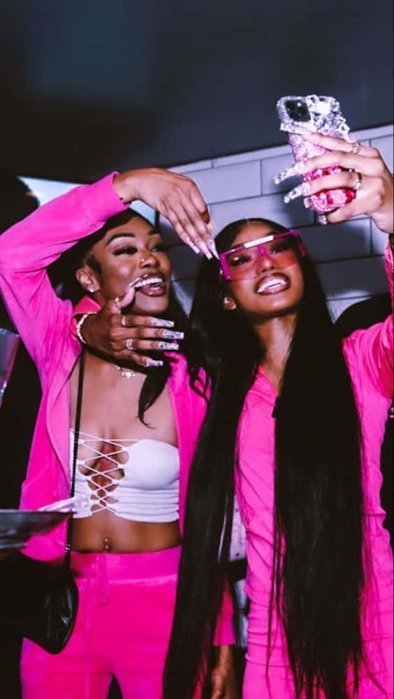 Pink Outfits Taking A Selfie Wallpaper