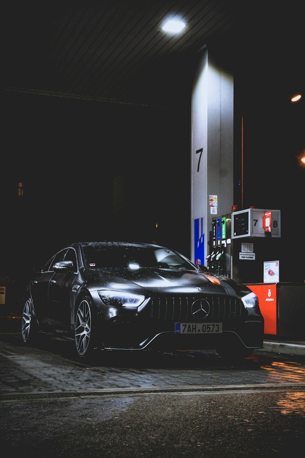Black Mercedes Benz Car At Gas Station