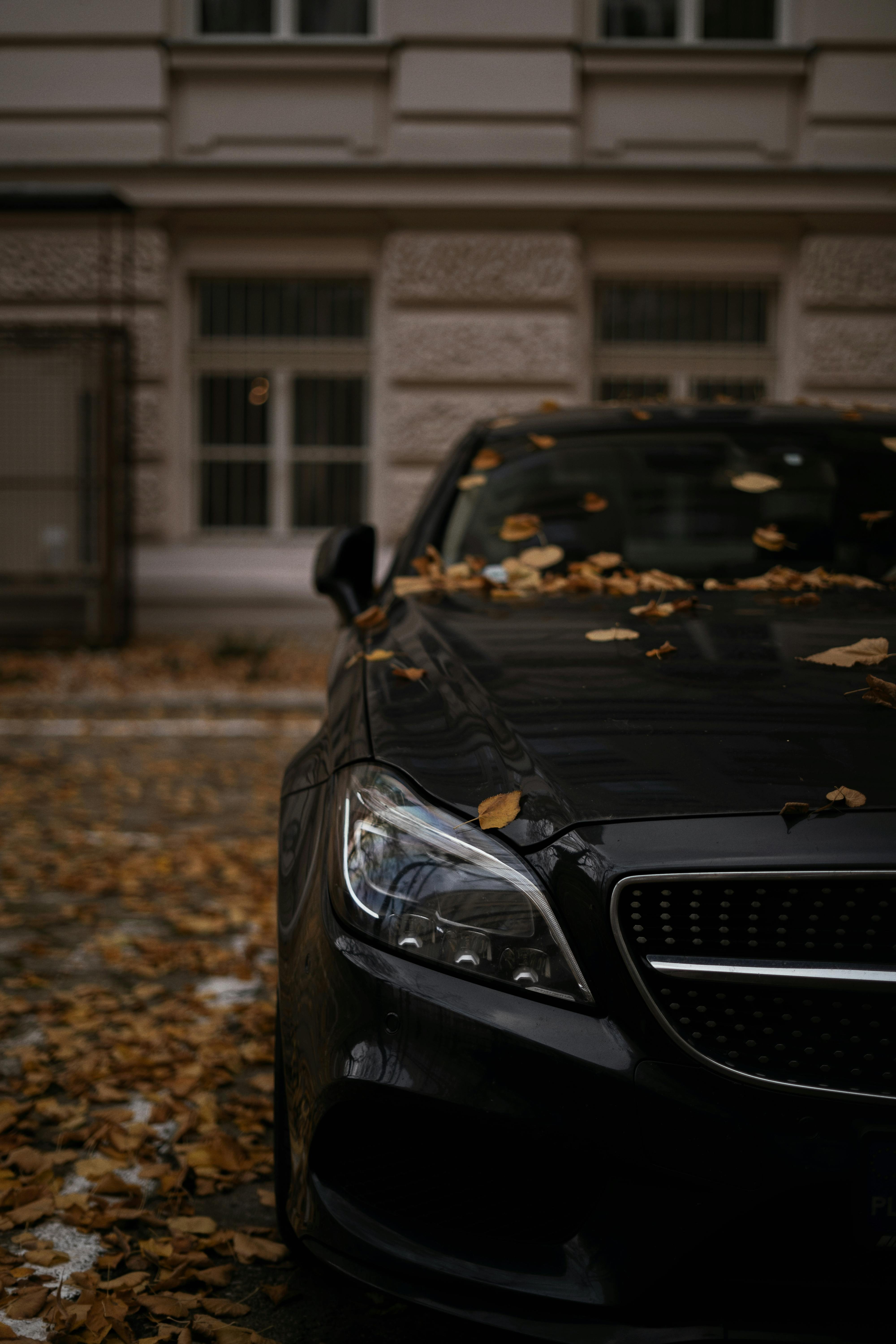 A black mercedes car parked on