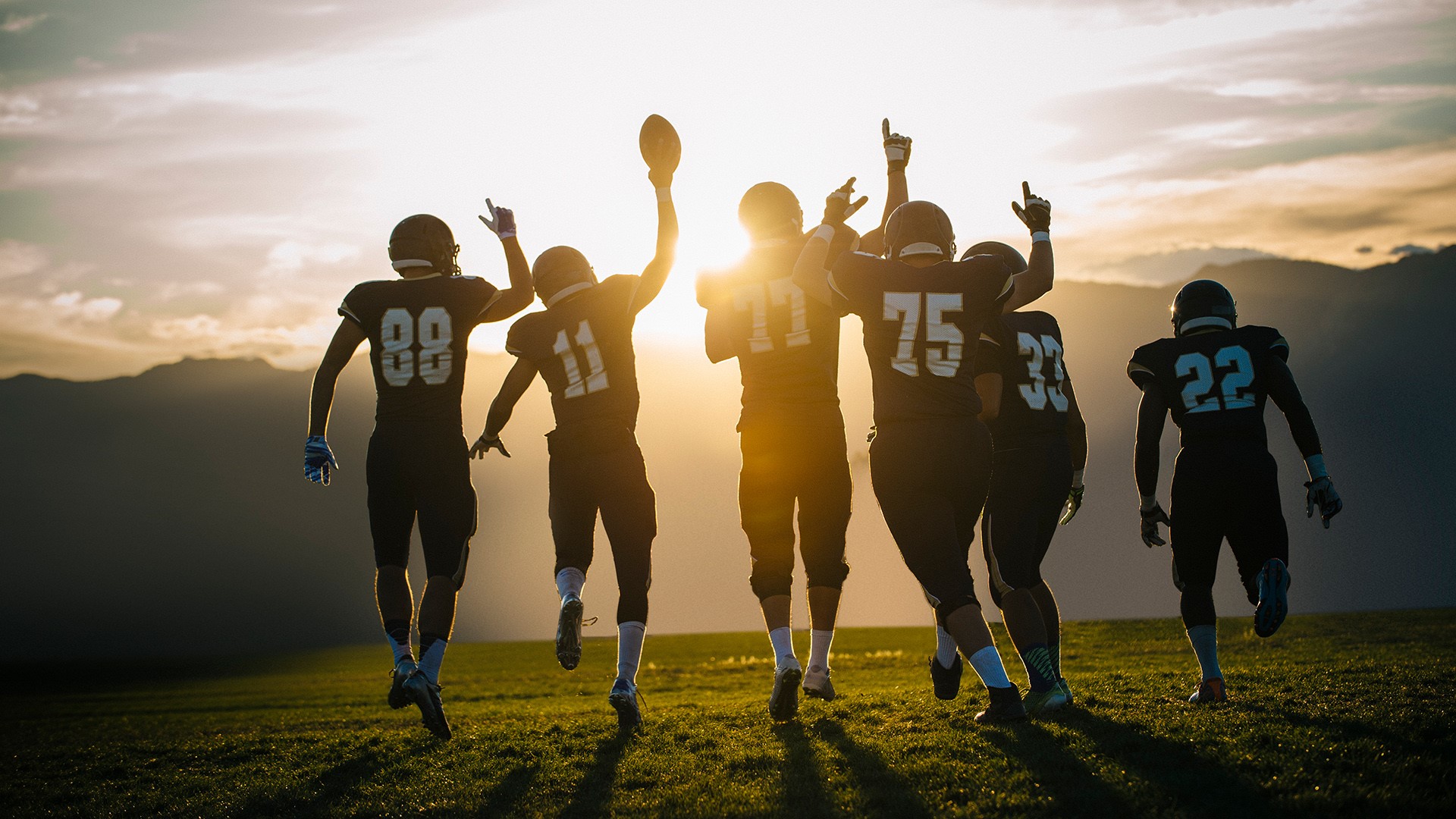 Rear view of teenage and young male