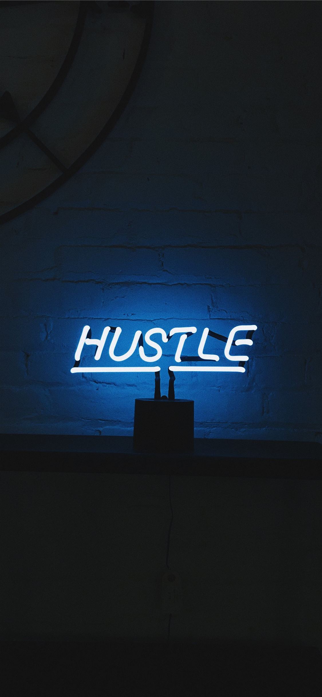 hustle LED signage turned on iPhone