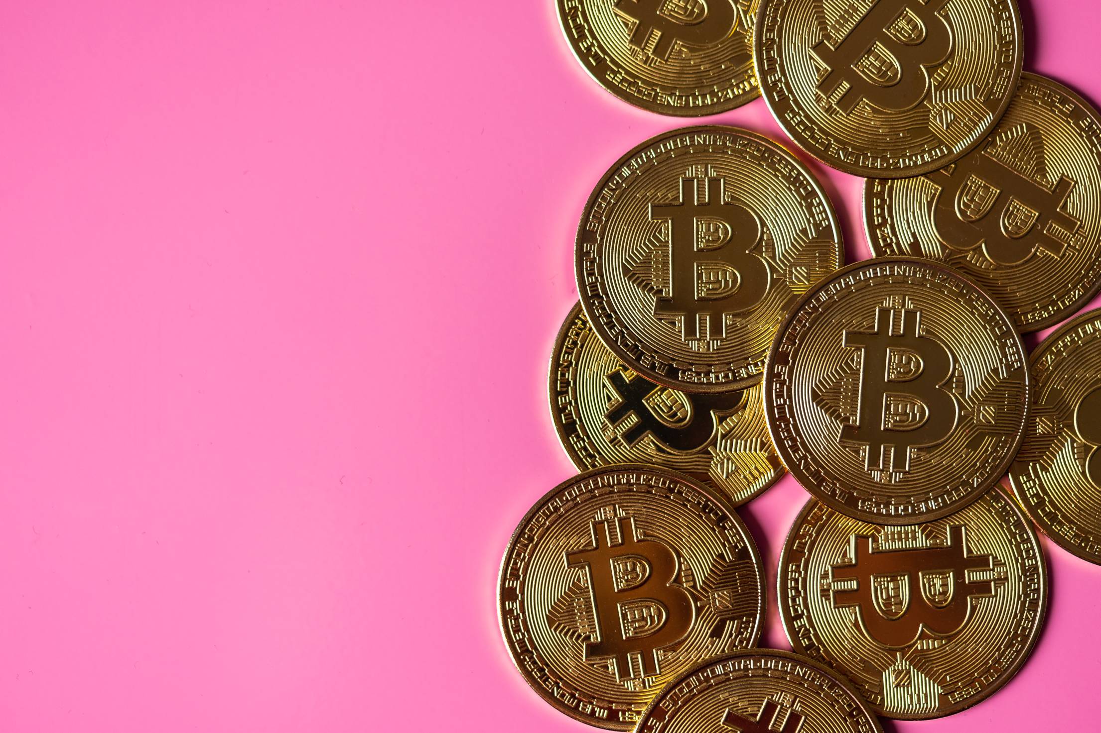 Bitcoin Coins on Pink Background Free