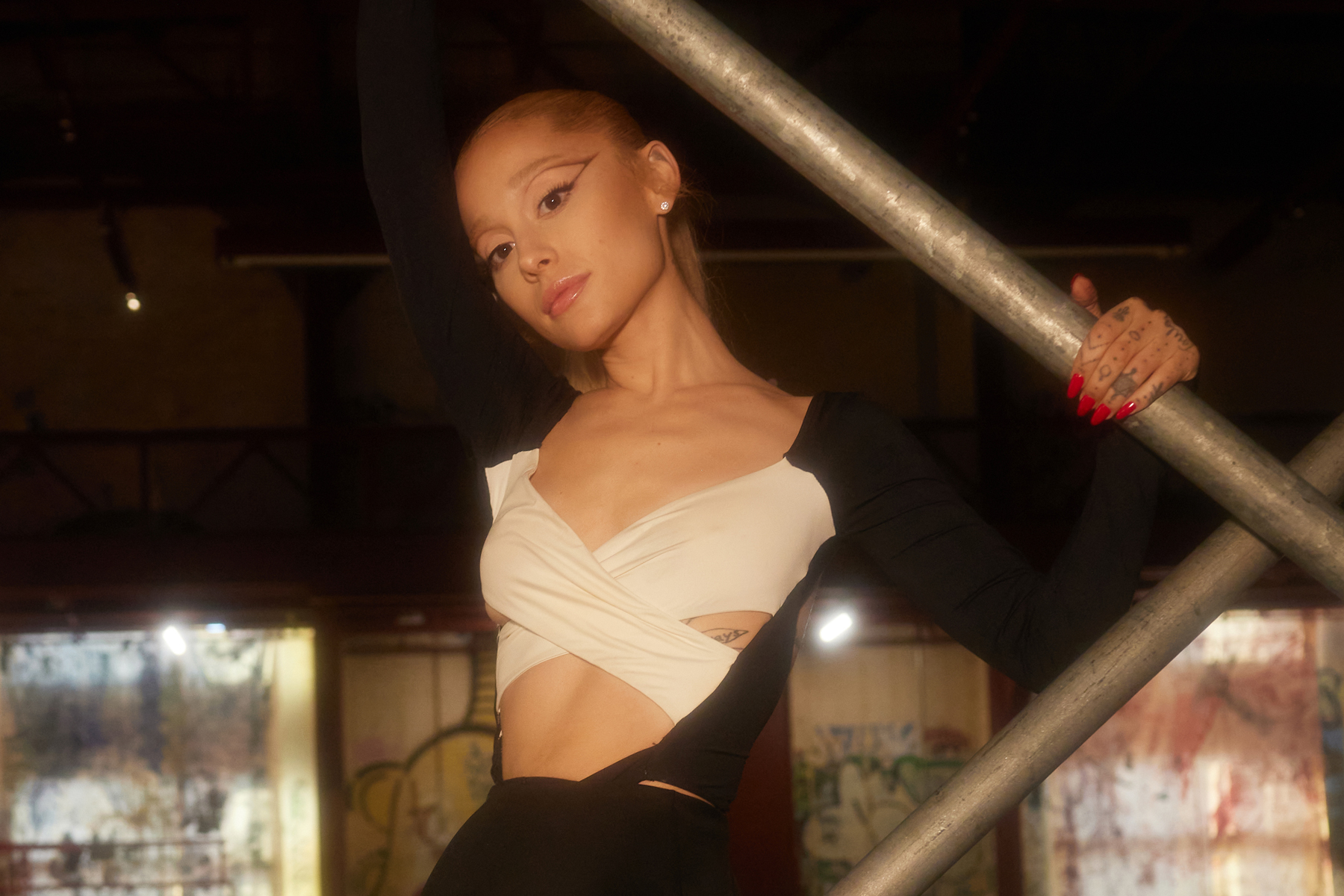 Ariana Grande Tears Up as She Describes