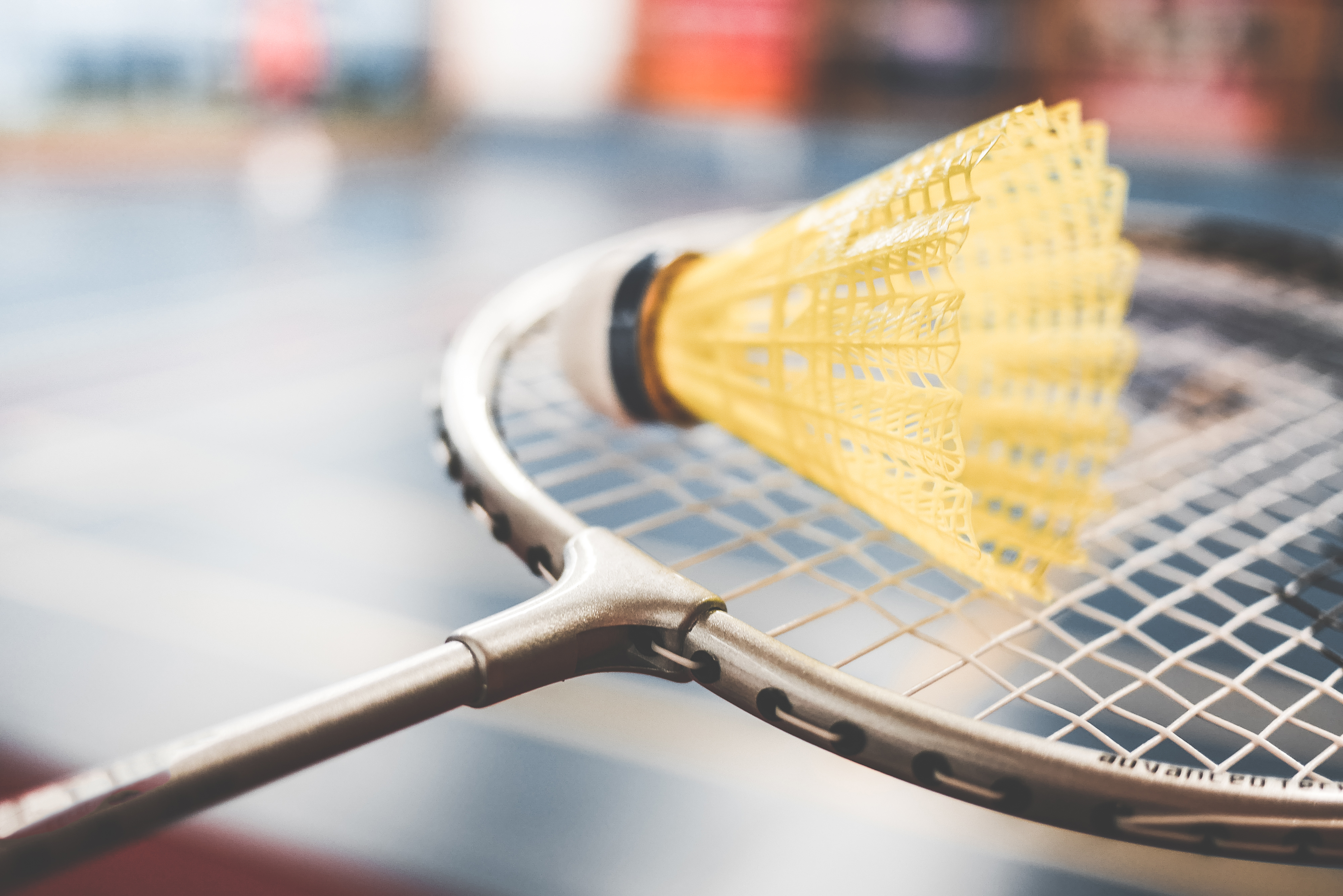 Badminton Racket and Yellow Shuttlecock