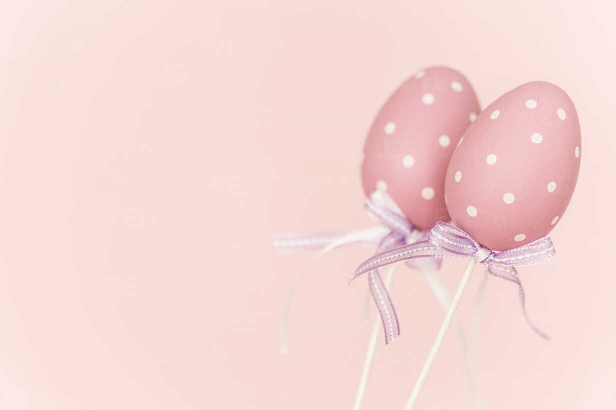 Pink plastic easter eggs before pink