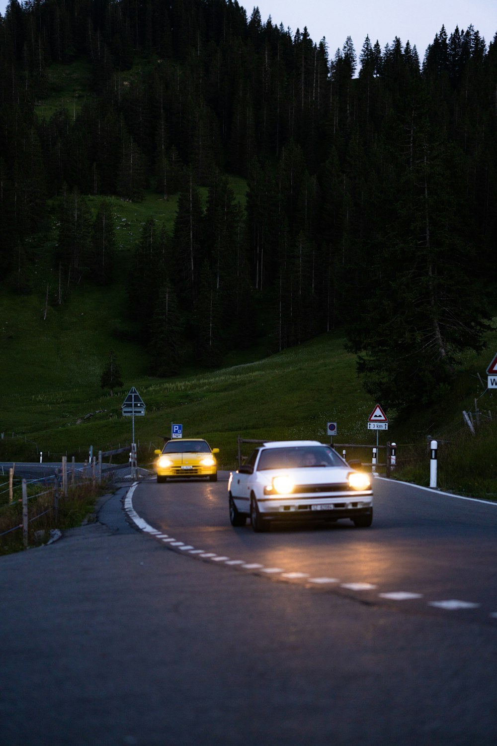 Cars driving on a road photo