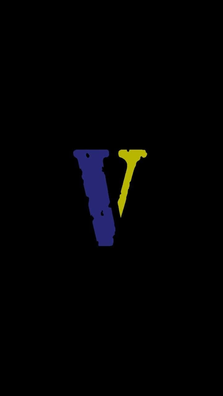 Yellow Logo With The Letter V Wallpaper