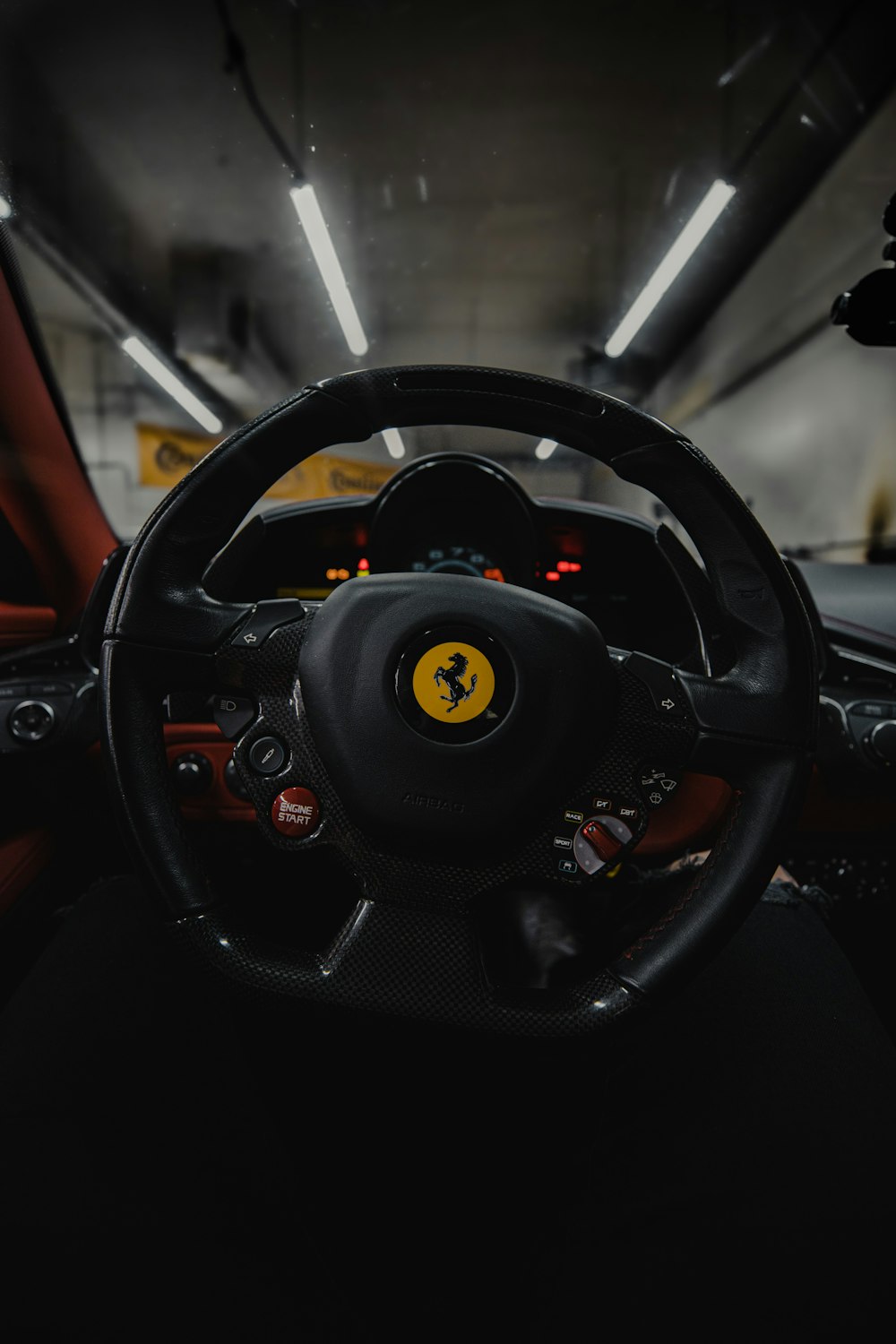 Black steering wheel in close up