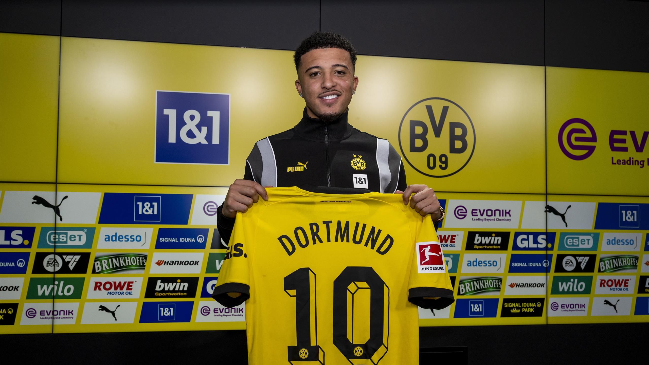 Jadon Sancho completes return to