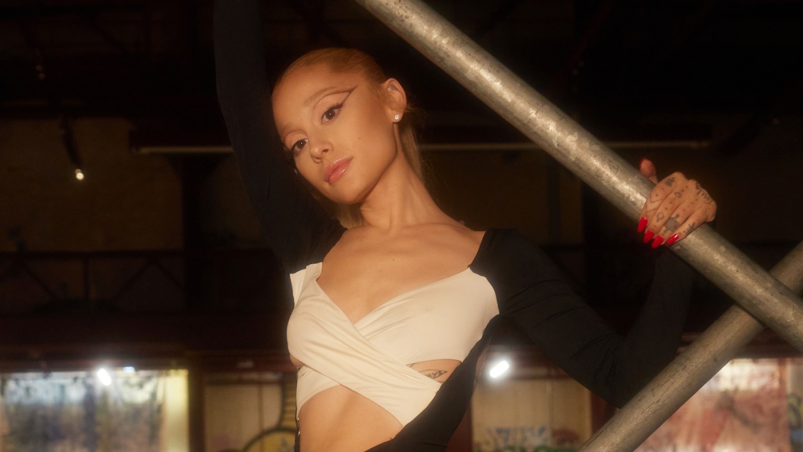 Ariana Grande Tears Up as She Describes