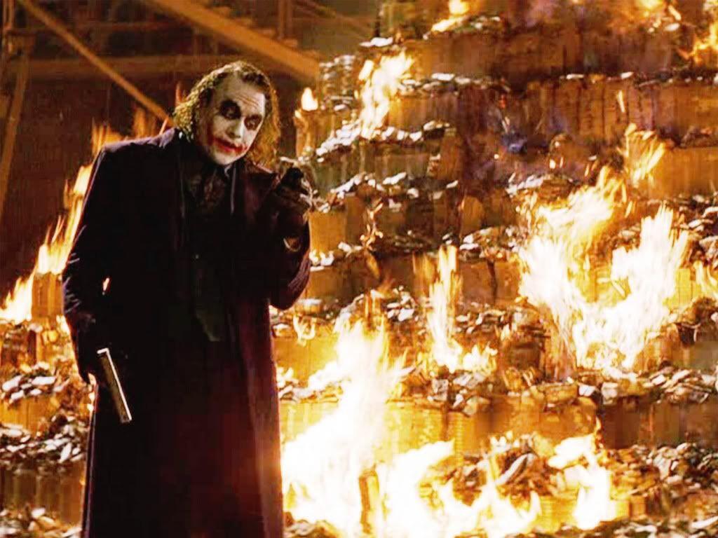 The Joker burns a huge pile of money