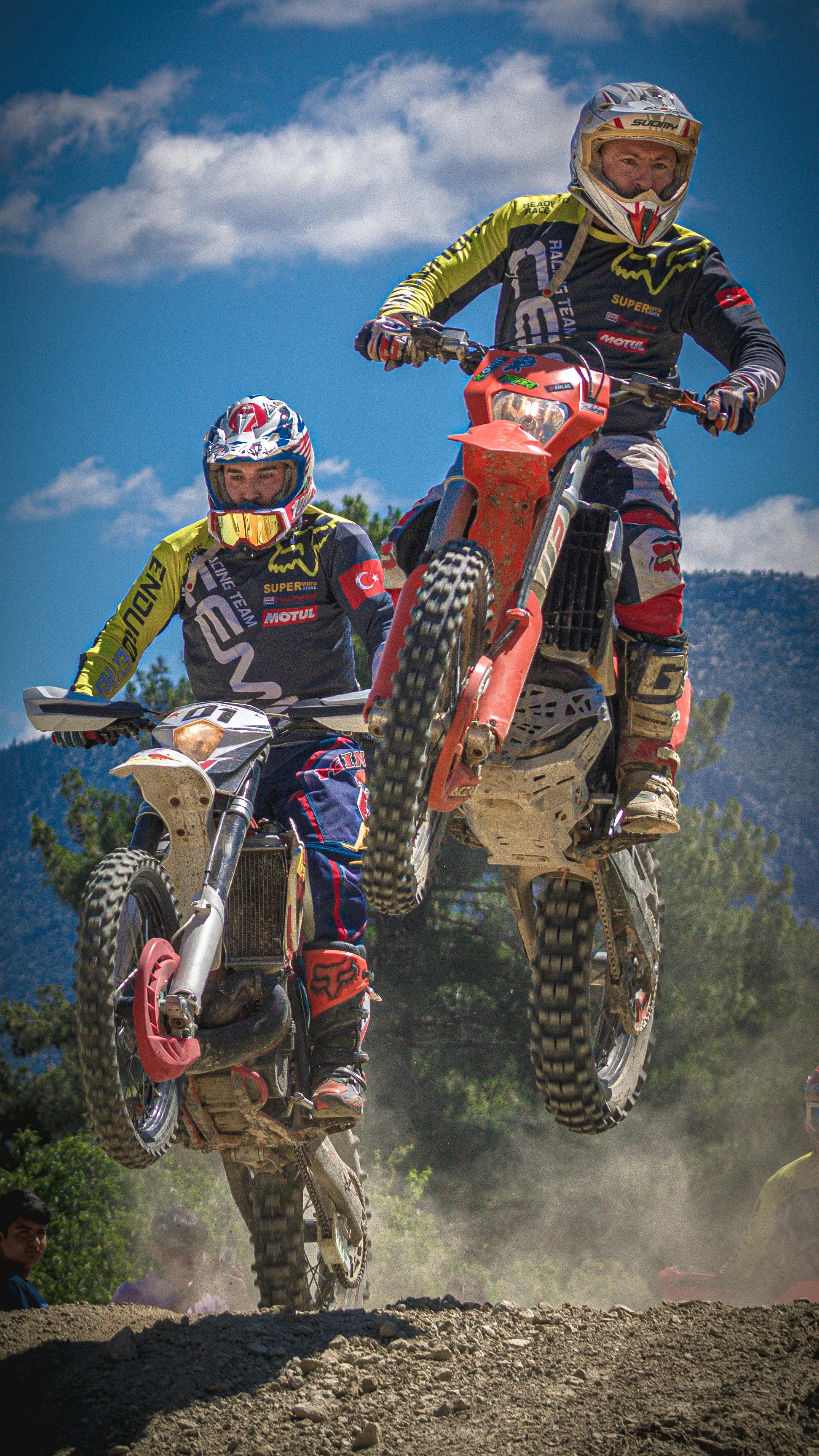 Two Men Riding a Motocross · Free Stock