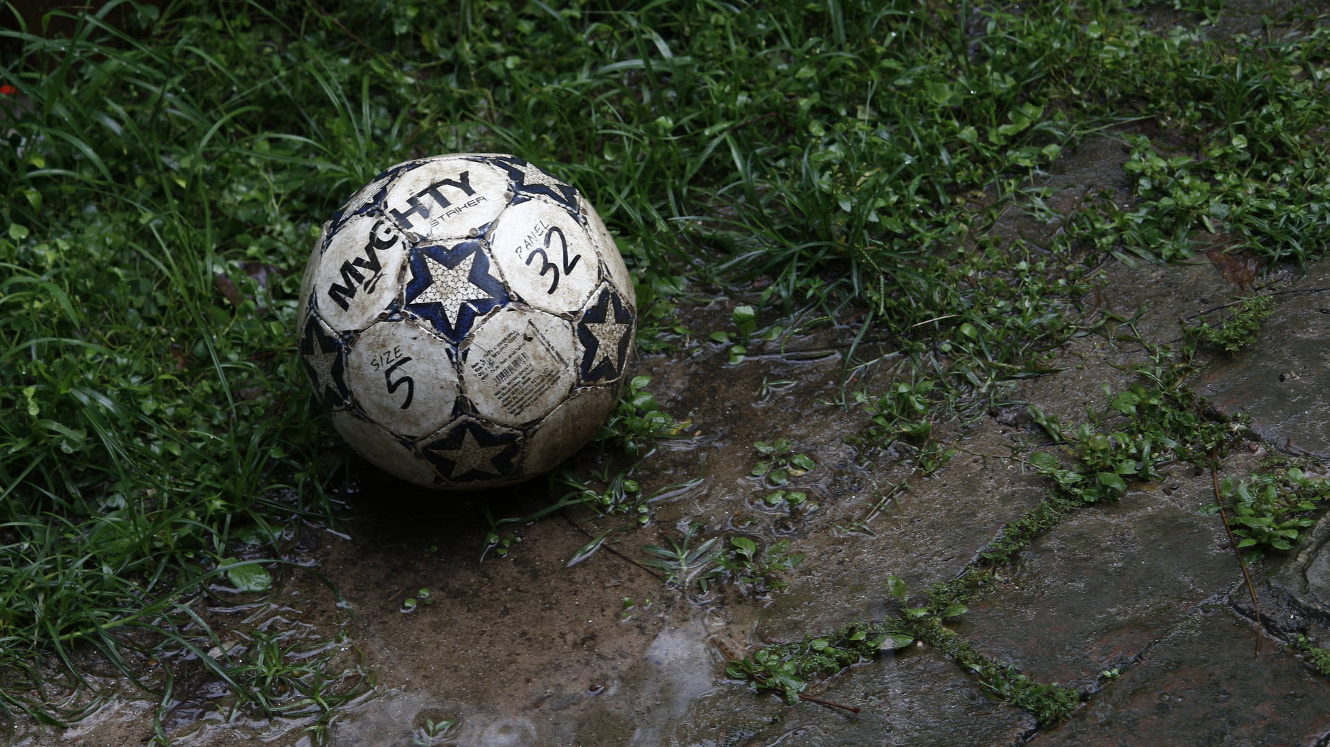 muddy football lays unclaimed