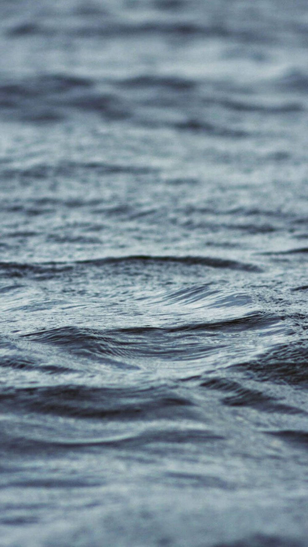 Download The ocean beckons with a breathtaking view Wallpaper