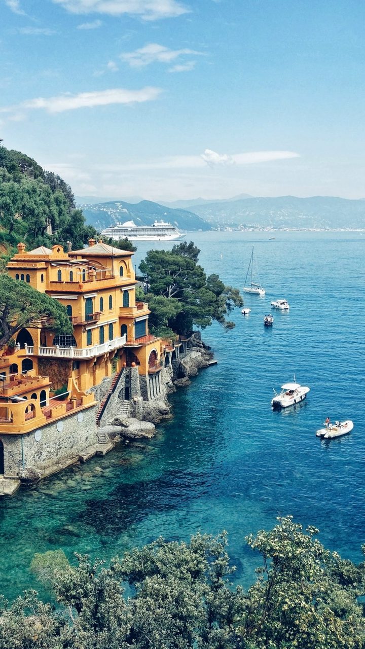 Sea shore cliffs with blue water