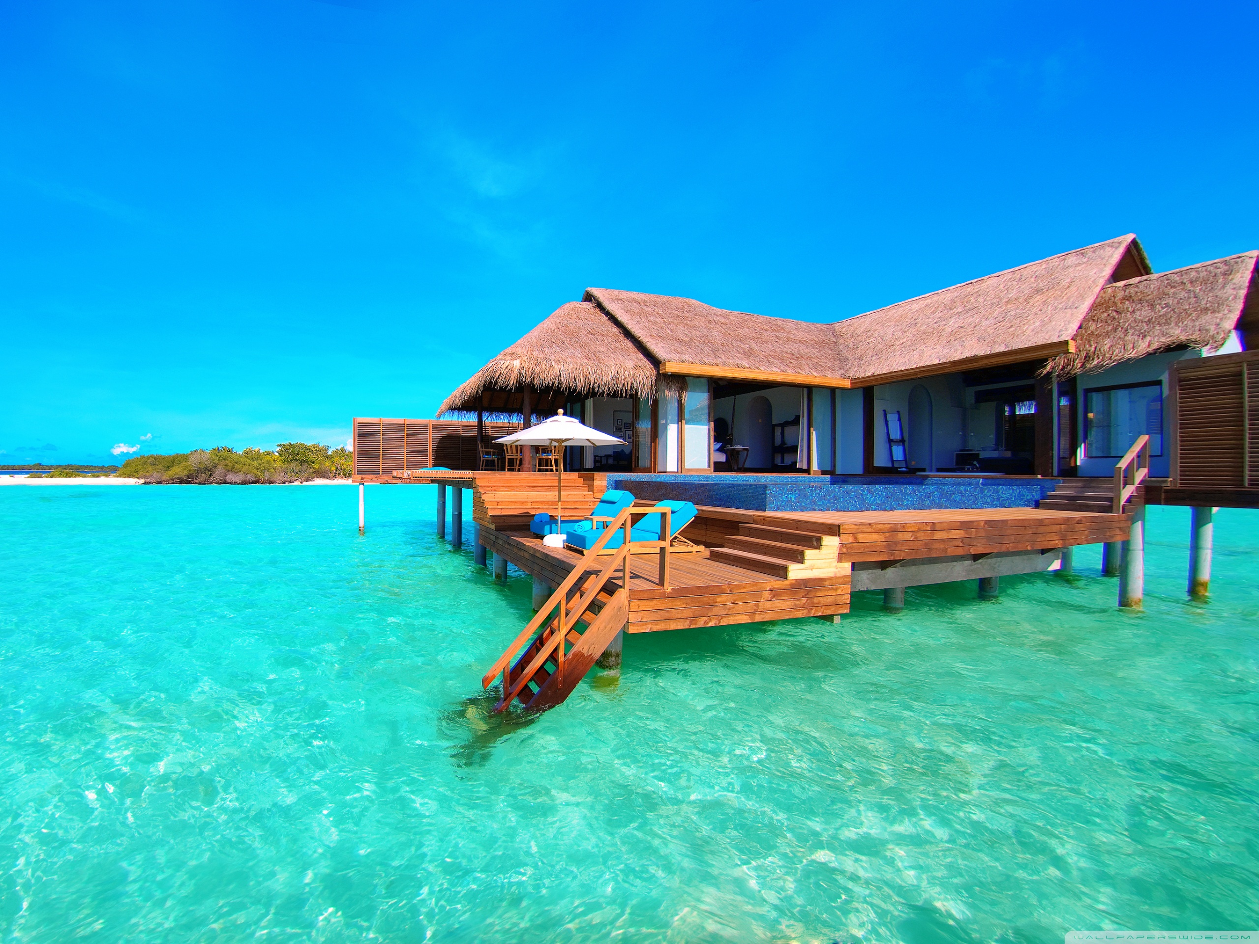Water Bungalows On A Tropical Island