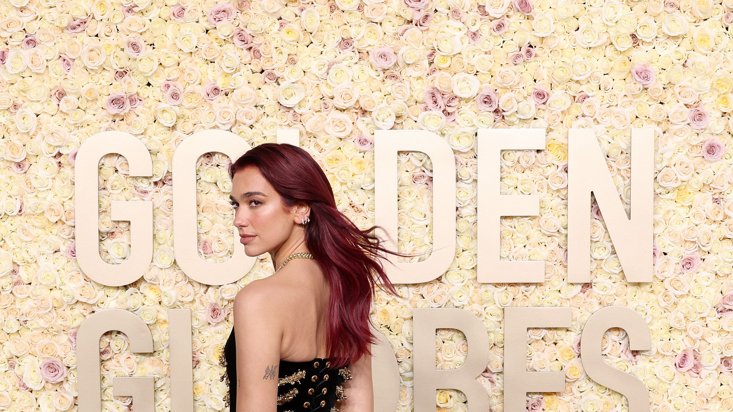 Dua Lipa Wears Black Gown at the 2024