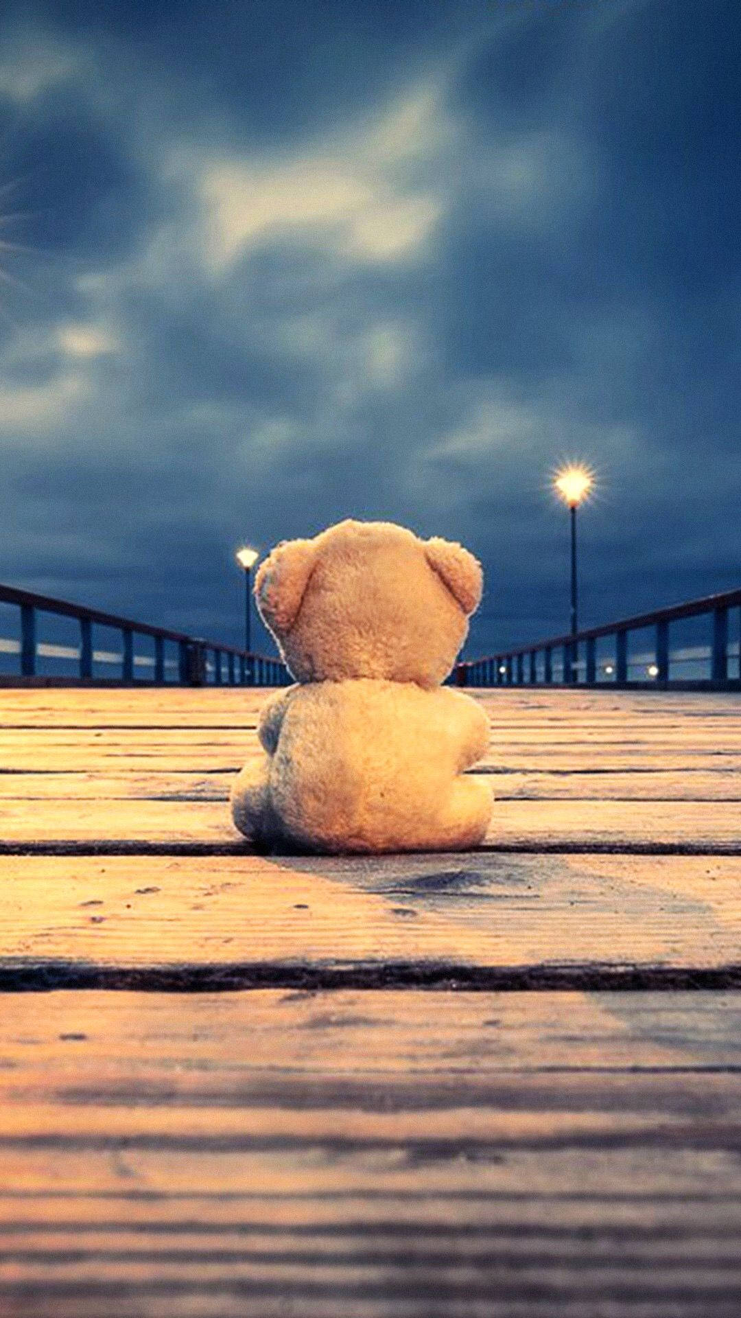 Teddy Bear On Wooden Bridge Wallpaper