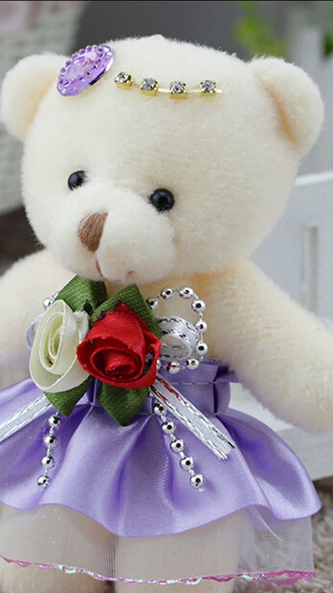 Download A Teddy Bear In A Purple Dress