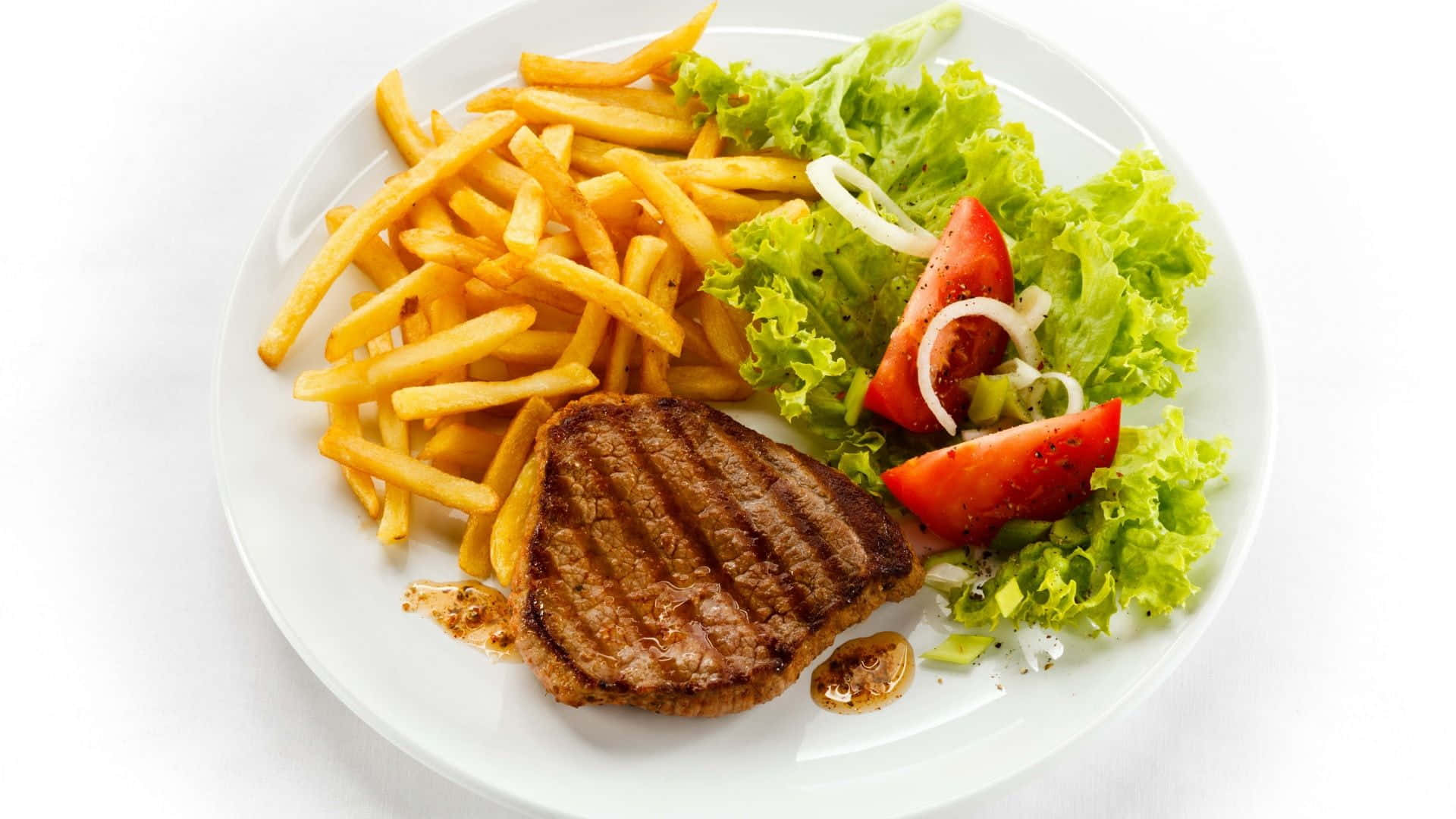 Plate With Steak, Fries And Salad