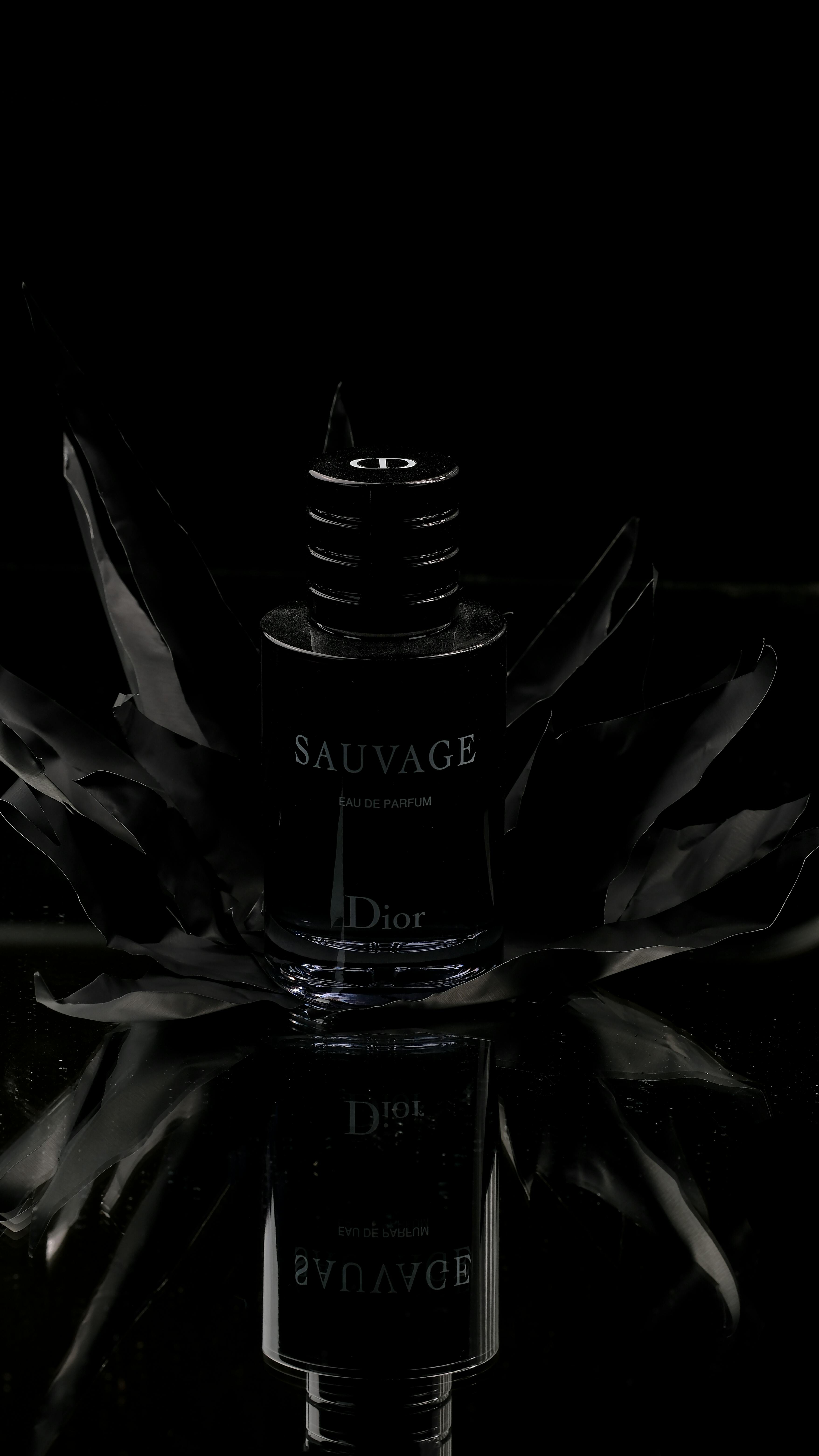 Close Up Shot Of A Black Perfume Bottle