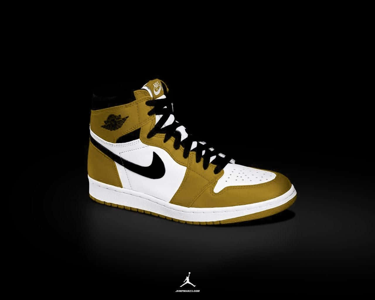 Download A Gold And White Jordan Shoe