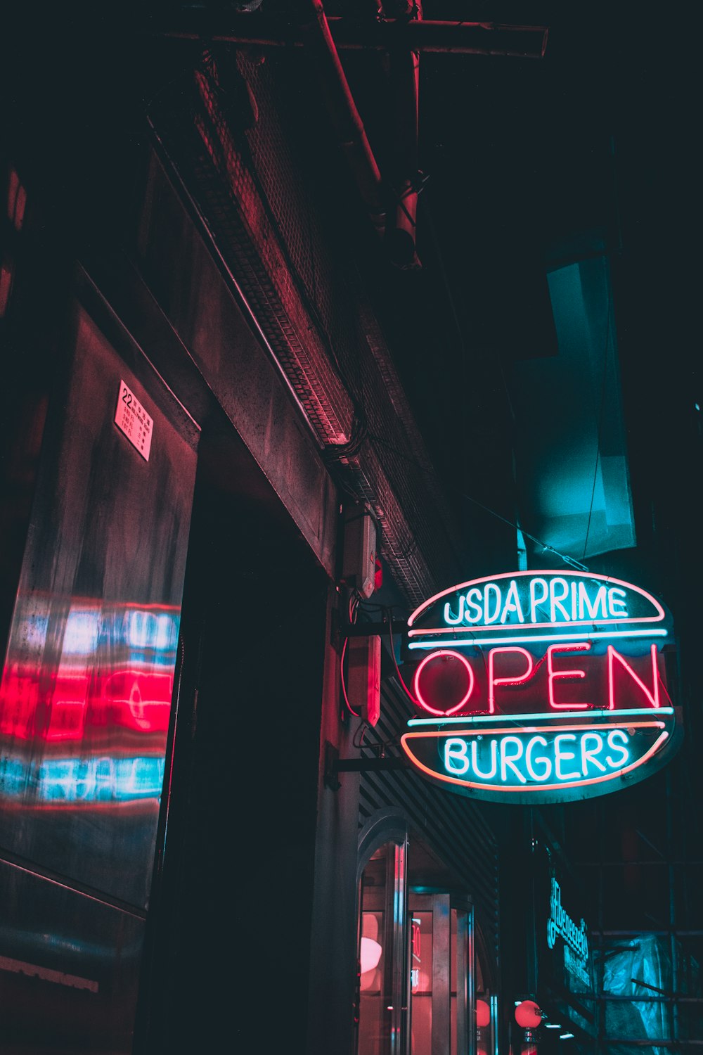white Usda Prime Burgers Open neon sign