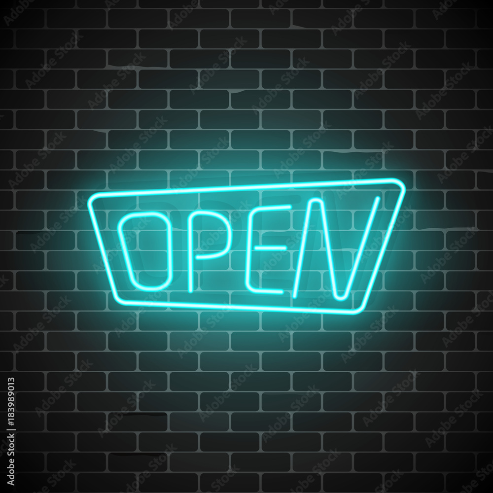 Glowing neon open sign on a brick wall