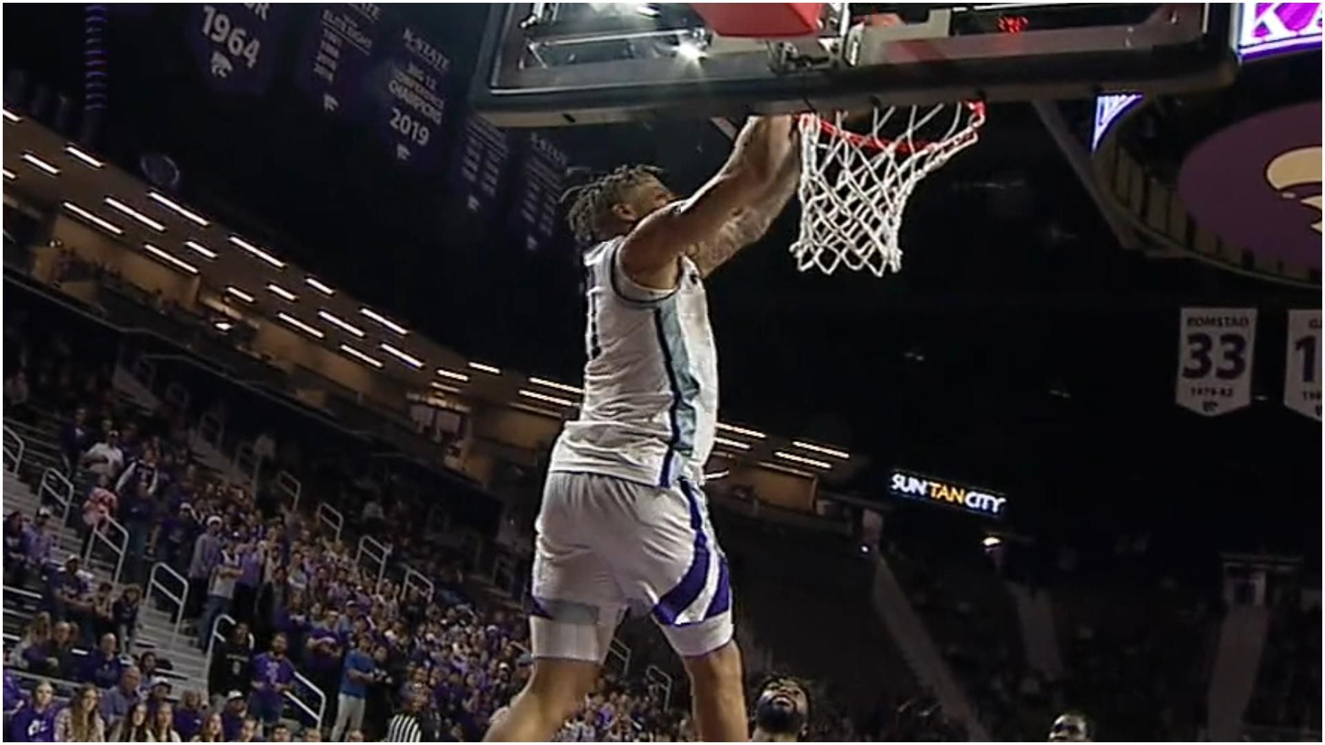 Keyontae Johnson flushes home the half